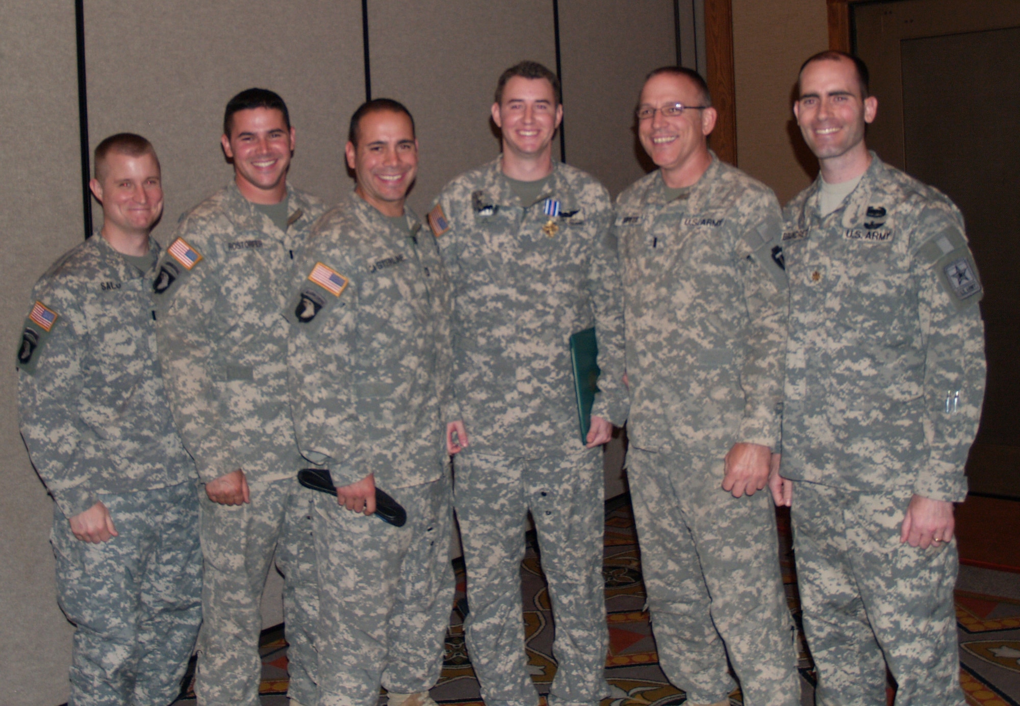 From left, Capt. Matthew Salo, platoon leader; Capt. Stacy Rostofer, platoon leader; Capt. Todd Casterline, executive officer; Chief Warrant Officer 2 Allen Crist, Distinguished Flying Cross recipient and pilot; Chief Warrant Officer 4 Kevin Purtee, pilot; and Maj. Charles Brundrett, commander. The five Texas National Guard members flew in especially for the occasion. (Photo by Rachel Knight/Missouri National Guard)