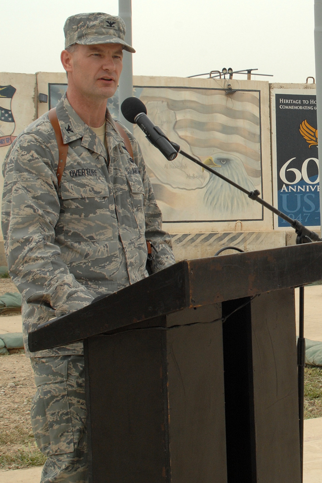KIRKUK REGIONAL AIR BASE, Iraq – Col. Eric Overturf, 506th Air Expeditionary Group commander, speaks to audience members during the 506th AEG change-of-command ceremony here April 30. Colonel Overturf, a Greeley, Colo., native deployed here from Elmendorf Air Force Base, Alaska, assumed command from Col. John Costa during the approximately 30-minute ceremony. (U.S. Air Force photo / Staff Sgt. Eunique Stevens)