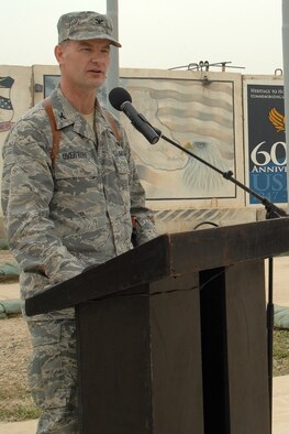 KIRKUK REGIONAL AIR BASE, Iraq – Col. Eric Overturf, 506th Air Expeditionary Group commander, speaks to audience members during the 506th AEG change-of-command ceremony here April 30. Colonel Overturf, a Greeley, Colo., native deployed here from Elmendorf Air Force Base, Alaska, assumed command from Col. John Costa during the approximately 30-minute ceremony. (U.S. Air Force photo / Staff Sgt. Eunique Stevens)