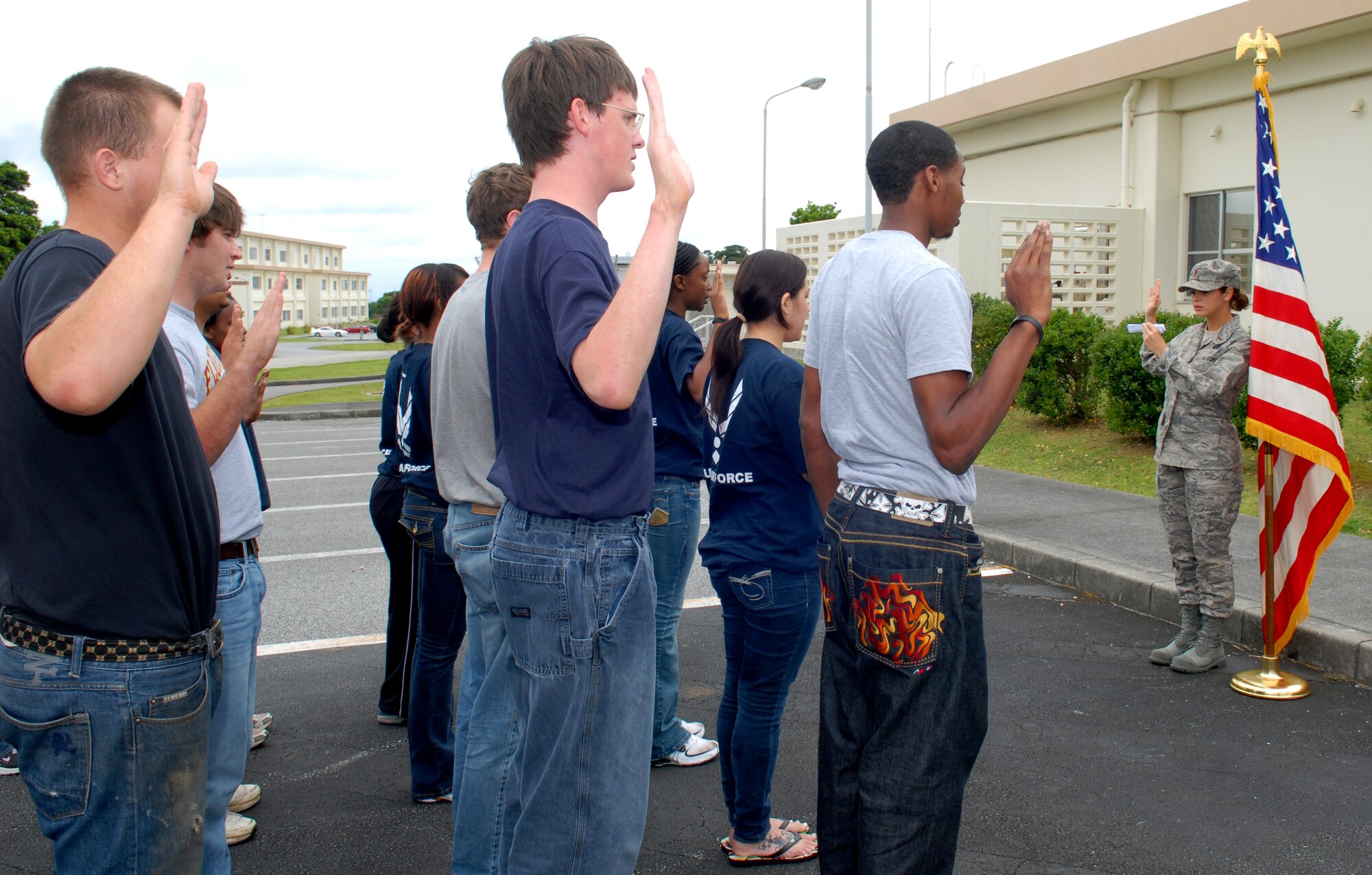 U.S. Air Force recruits in the Delayed Enlistment Program practice the Oath of Enlistment as part of the "Day at BMT" program April 25 at Kadena Air Base, Japan. The program was started to help prepare new recruits for Basic Military Training.
(U.S. Air Force photo/Staff Sgt. Angelique Perez)
