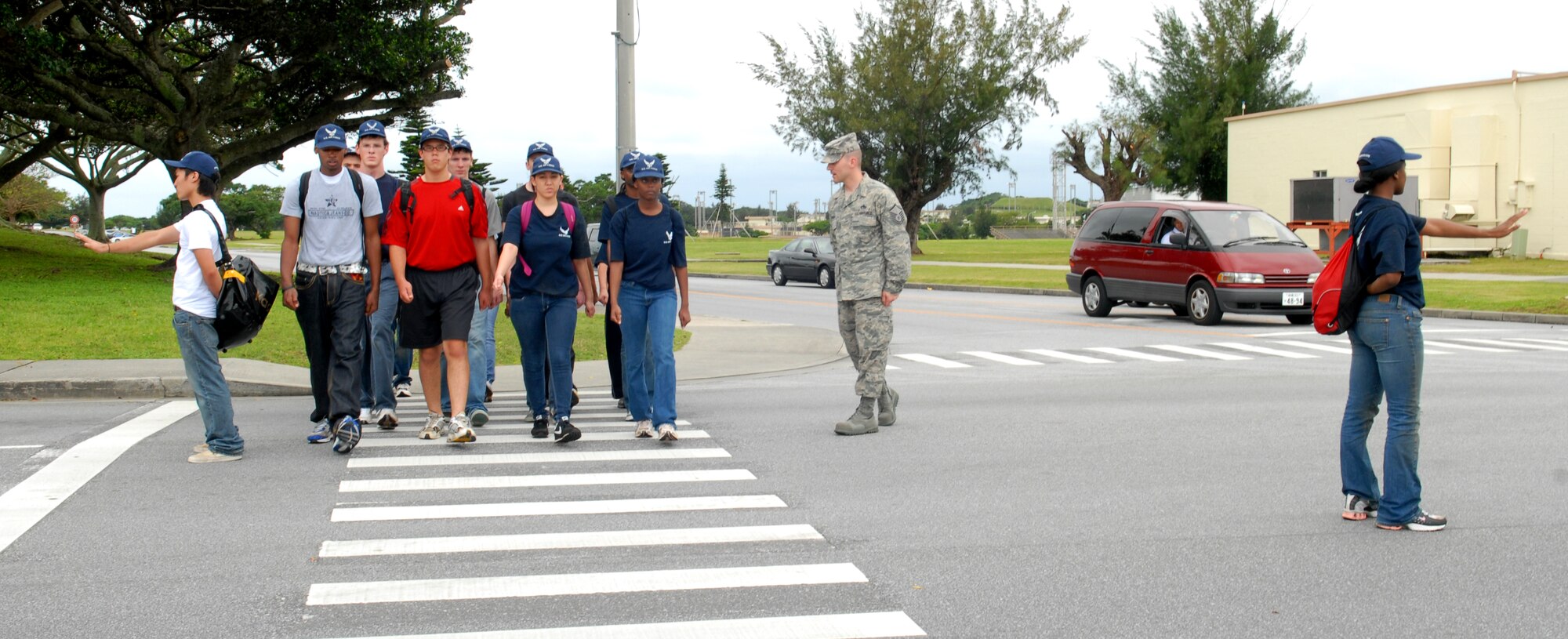 U.S. Air Force Master Sgt. Jason Lamoureux, a prior Military Training Instructor currently with the 733rd Air Mobility Squadron, gives marching training to recruits in the Delayed Enlistment Program during a "shake-down" as part of the "Day at BMT" program April 25 at Kadena Air Base, Japan. The program was started to help prepare new recruits for Basic Military Training.
(U.S. Air Force photo/Staff Sgt. Angelique Perez)

