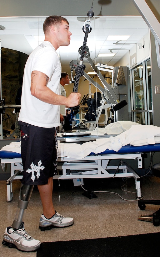 Army Sgt. Joshua Ben works out at Walter Reed Army Medical Center's Military Advanced Training Center in Washington, D.C., April 21, 2009. The training center, is dedicated to amputees. Ben lost his right leg above the knee while serving in Iraq. 