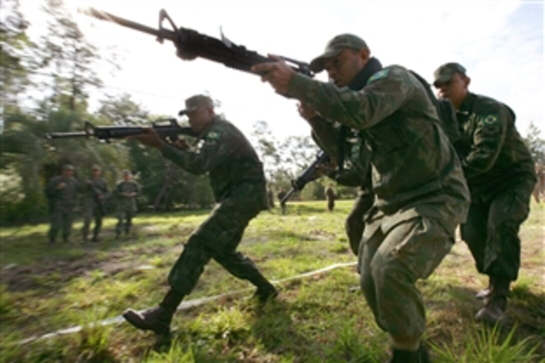 Brazilian Marines demonstrate lane training techniques during Partnership of the Americas 2009, Camp Blandig, Fla., April 18, 2009. The exercise focuses on enhancing interoperability between U.S. Marines and partner-nation Marines in the areas of amphibious operations, non-combatant evacuation operations, and peacekeeping.