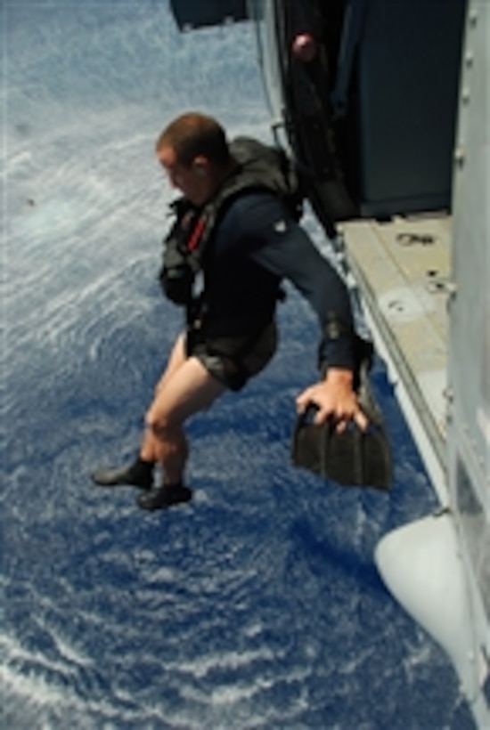U.S. Navy Petty Officer 2nd Class Todd Coulard jumps from a MH-60S Seahawk helicopter during the search and rescue exercise portion of UNITAS Gold on April 27, 2009.  Maritime forces from Brazil, Canada, Chile, Colombia, Ecuador, Germany, Mexico, Peru, the United States and Uruguay are participating in UNITAS Gold, which provides the opportunity to conduct and integrate joint and combined land, maritime, coast guard and air operations in a realistic training environment.  