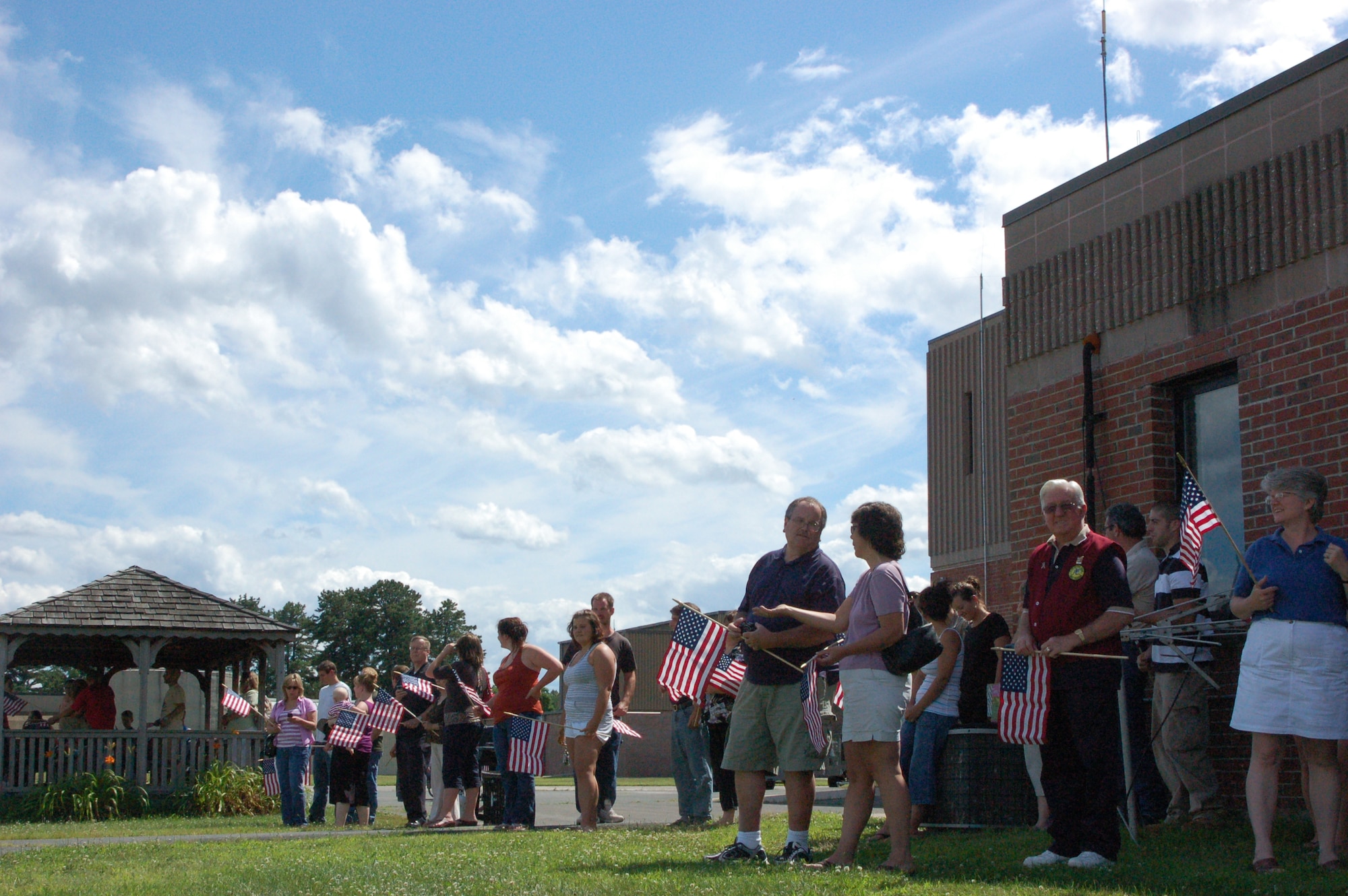 Families gather July 19, 2009, along the back side of the main hangar at Bradley Air National Guard Base, East Granby, Conn. to see their loved-ones board a C-9 bound for Southwest Asia in support of overseas contingency operations.  (U.S. Air Force photo by Tech. Sgt. Joshua Mead)