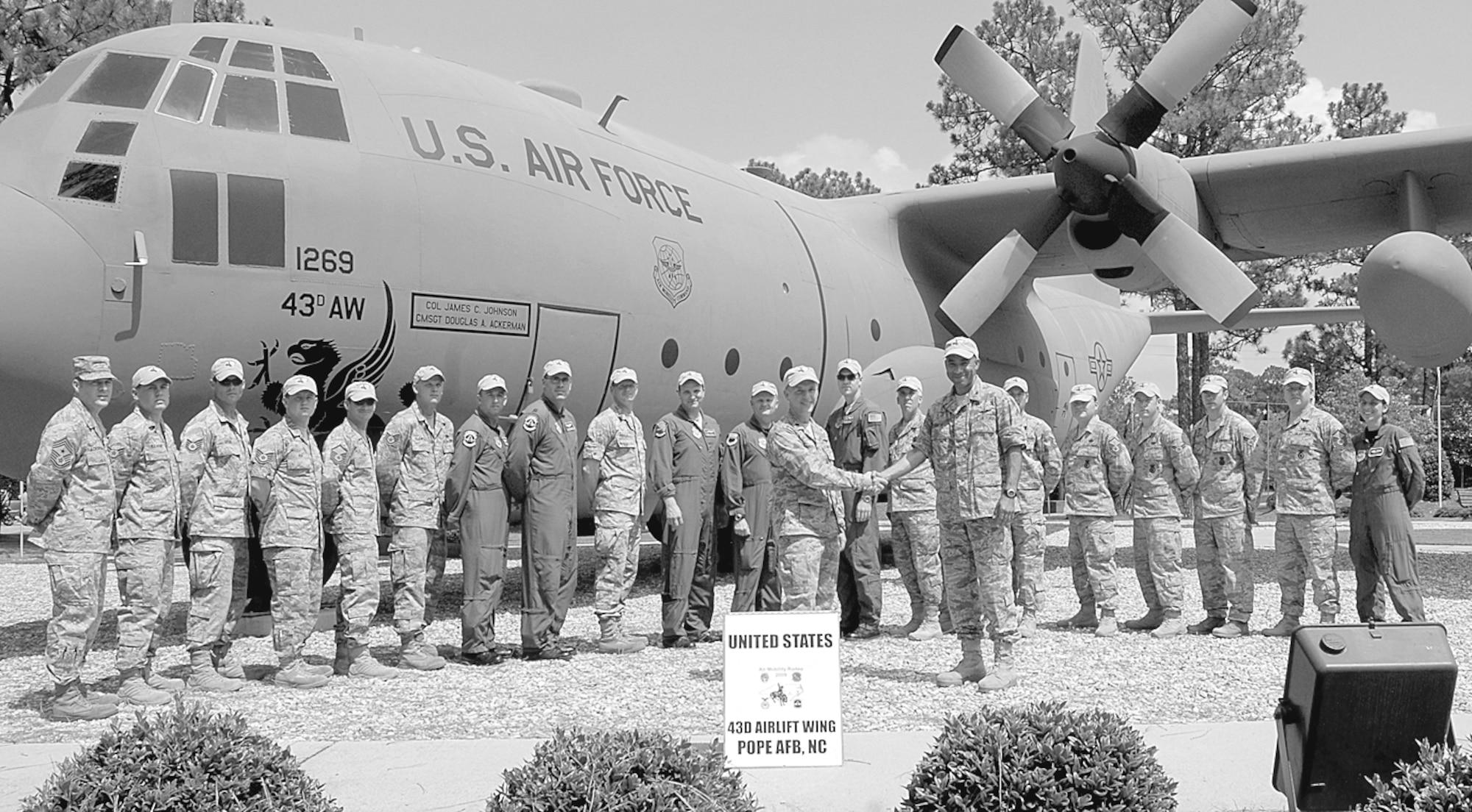 Col. James Johnson, 43rd Airlift Wing Commander, recognizes Lt. Col. Jonathan Shockey, RODEO team chief, and Team Pope participants who competed in the 2009 Air Mobility RODEO. Team Pope was one of more than 100 teams participating in RODEO competition, including teams from seven foreign countries. (U.S. Photo by 2nd Lt. Cammie Quinn)