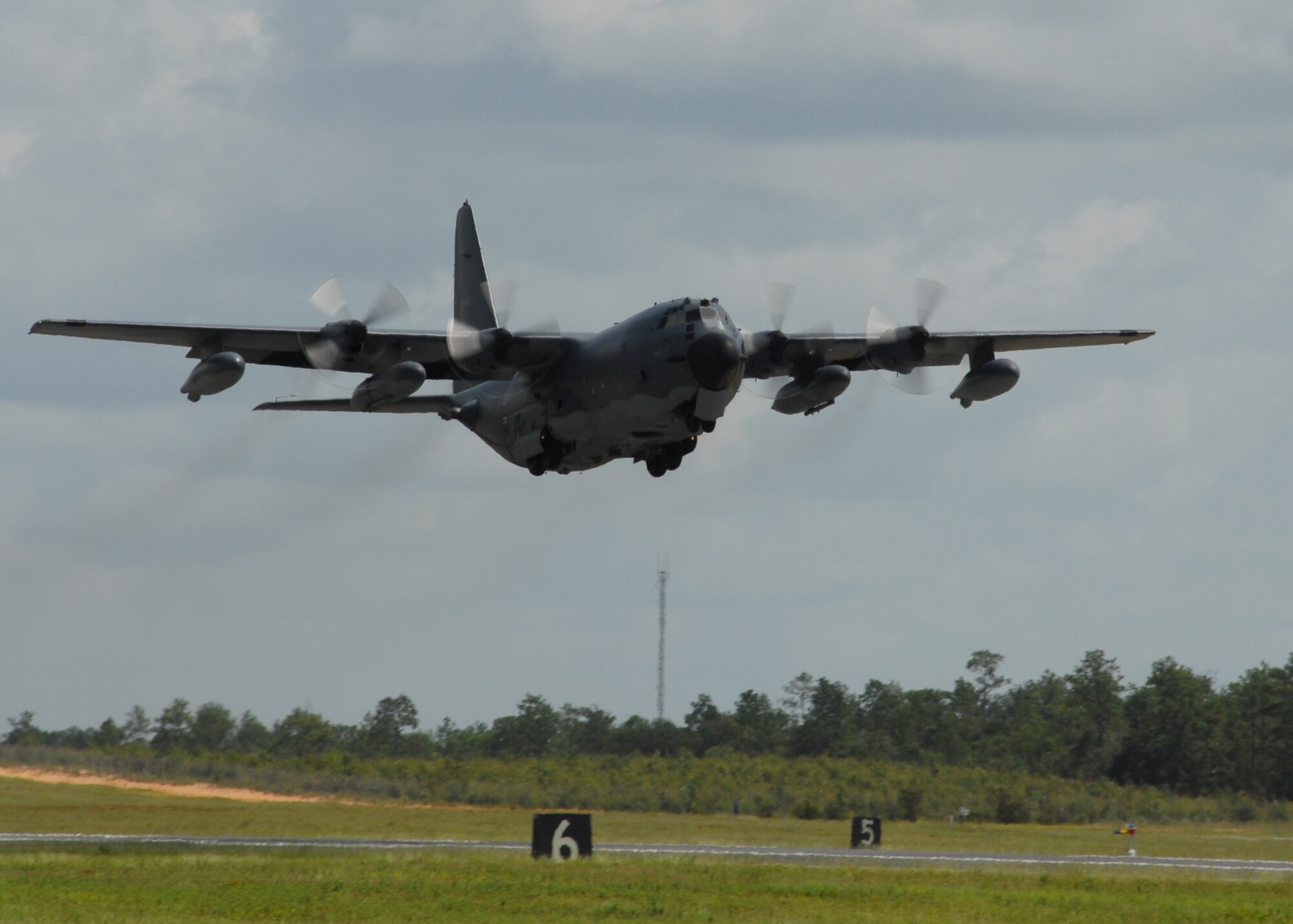 A 919th Special Operations Wing MC-130 lifts off the Duke Field runway for a mission July 30.  The 919th launched more than 850 sorties and averaged more than 2,000 flight hours last year.  (U.S. Air Force photo/Staff Sgt. Samuel King Jr.)