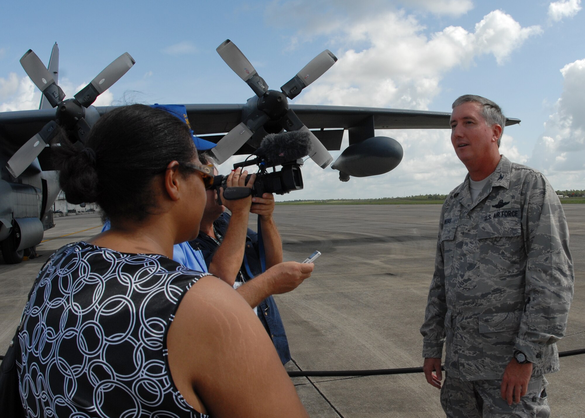 Col. Jon Weeks, 919th Special Operations Wing, speaks with members of the media during the 919th’s Media Day July 30 at Duke Field.  Affiliates from print, television and radio came out for a tour of the base facilities and a flight in an MC-130.  (U.S. Air Force photo/Staff Sgt. Samuel King Jr.) 