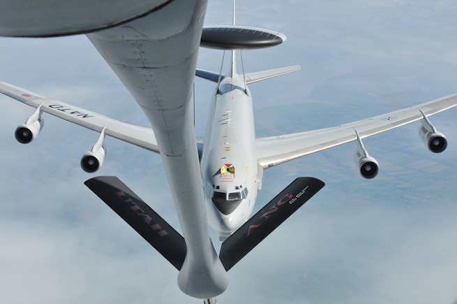 A Utah Air National Guard KC-135 tanker refuels a NATO E-3 Sentry AWACS above northern Germany July 29 during an air refueling training mission. The Utah Air National Guard is deployed for a two-week rotation to Geilenkirchen Air Base in Germany to support the NATO AWACS missions. U.S. Air Force photo by Airman 1st Class Lillian Chatwin. 