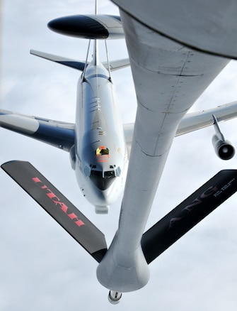 A Utah Air National Guard KC-135 tanker refuels a NATO E-3 Sentry AWACS above northern Germany July 29 during an air refueling training mission. The Utah Air National Guard is deployed for a two-week rotation to Geilenkirchen Air Base in Germany to support the NATO AWACS missions. U.S. Air Force photo by Airman 1st Class Lillian Chatwin. 