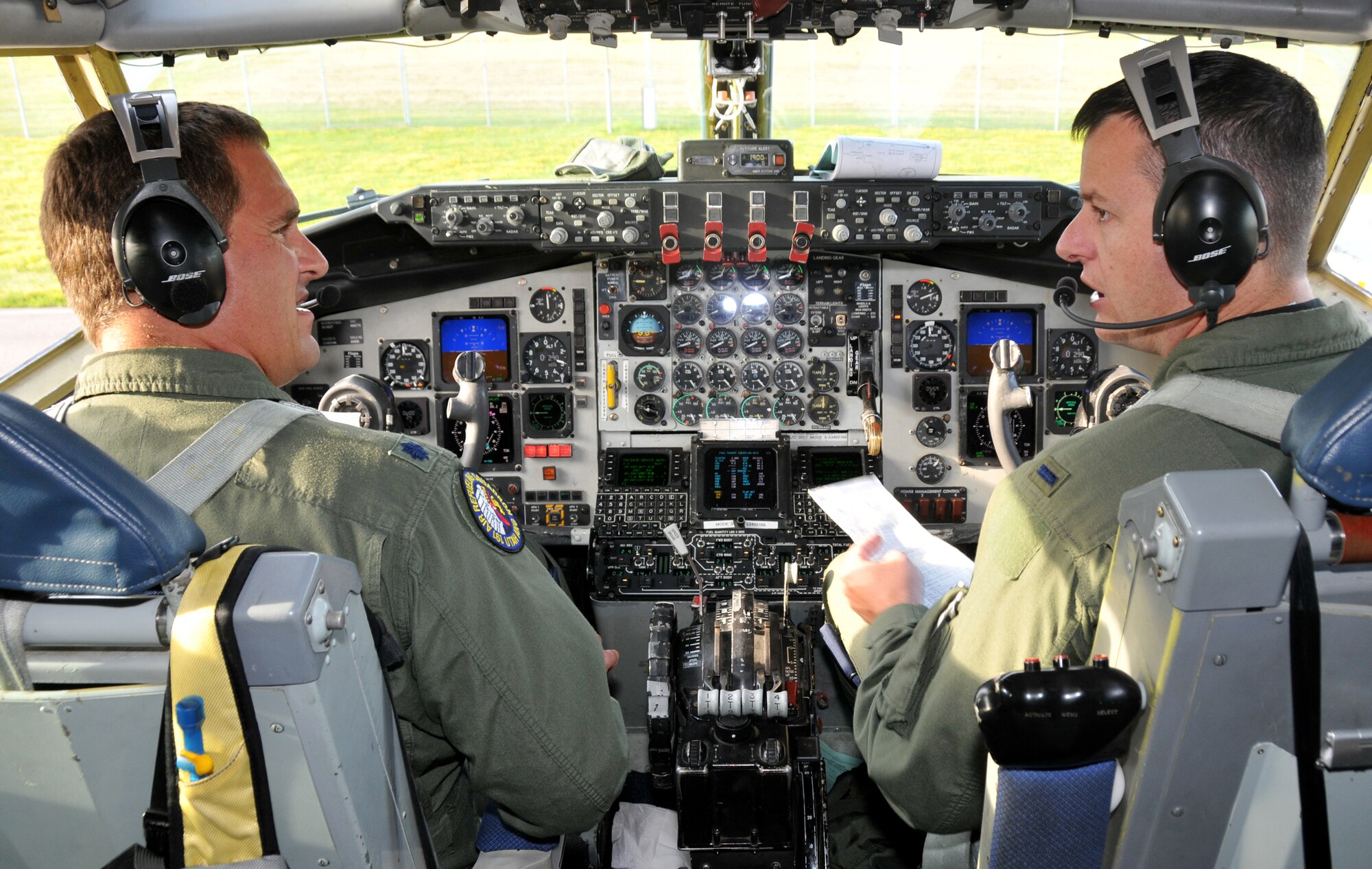 Lt. Col. Boyd Badli and 1st Lt. David Geerdes, both pilots with the 151st Air Refueling Wing, prepare for an Airbourne Warning and Control System (AWACS) refueling mission onboard a Utah Air National Guard KC-135 tanker. More than 35 Airmen from the Utah Air National Guard are deployed to Geilenkirchen Air Base, Germany from July 26 to August 7 to support the air refueling training for the NATO AWACS aircrews. The NATO crews are preparing for an upcoming deployment to support the International Security Assistance Force. U.S. Air Force photo by Airman 1st Class Lillian Chatwin. 