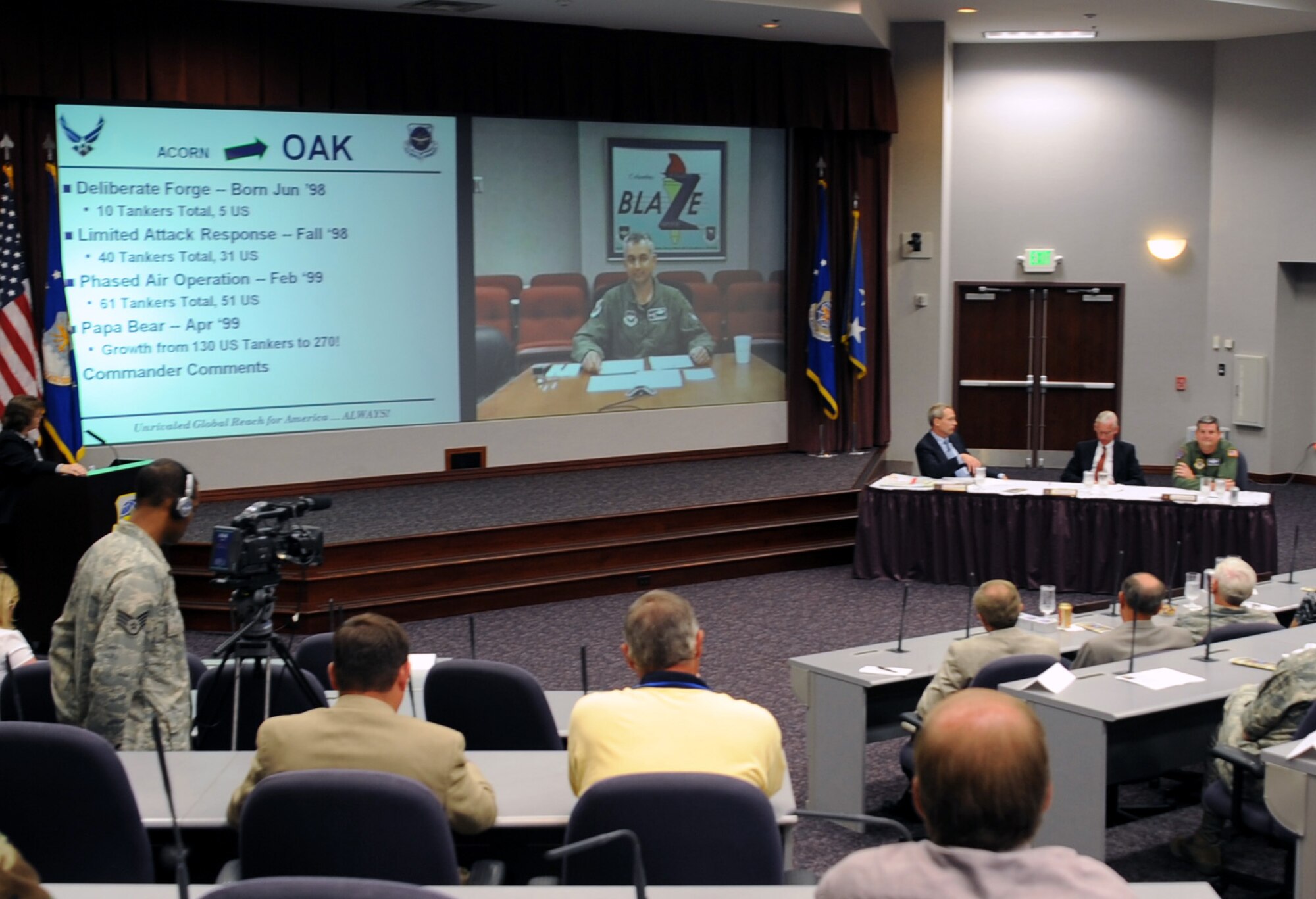 A four-person panel participating in the "Tanker Living Legends" speaker series hold their discussion at the Global Reach Planning Center July 30, 2009, at Scott Air Force Base, Ill.  The "Living Legends" speaker series includes a panel of veterans of past conflicts highlighting their experiences in air refueling during a military operation.  This session included Air Mobility Command Vice Commander Lt. Gen. Rusty Findley; retired Maj. Gen. Timothy "T.C." Jones, former Director of Programs at the Office of the Deputy Chief of Staff for Strategic Plans and Programs at Air Force Headquarters; retired Brig. Gen. Thomas Stickford, former 18th Air Force vice commander; and Col. Roger Watkins, commander of the 14th Flying Training Wing at Columbus Air Force Base, Miss. The panel observed their experiences from Operation Allied Force - the Air War over Kosovo in 1999. (U.S. Air Force Photo/Tech. Sgt. Scott T. Sturkol)