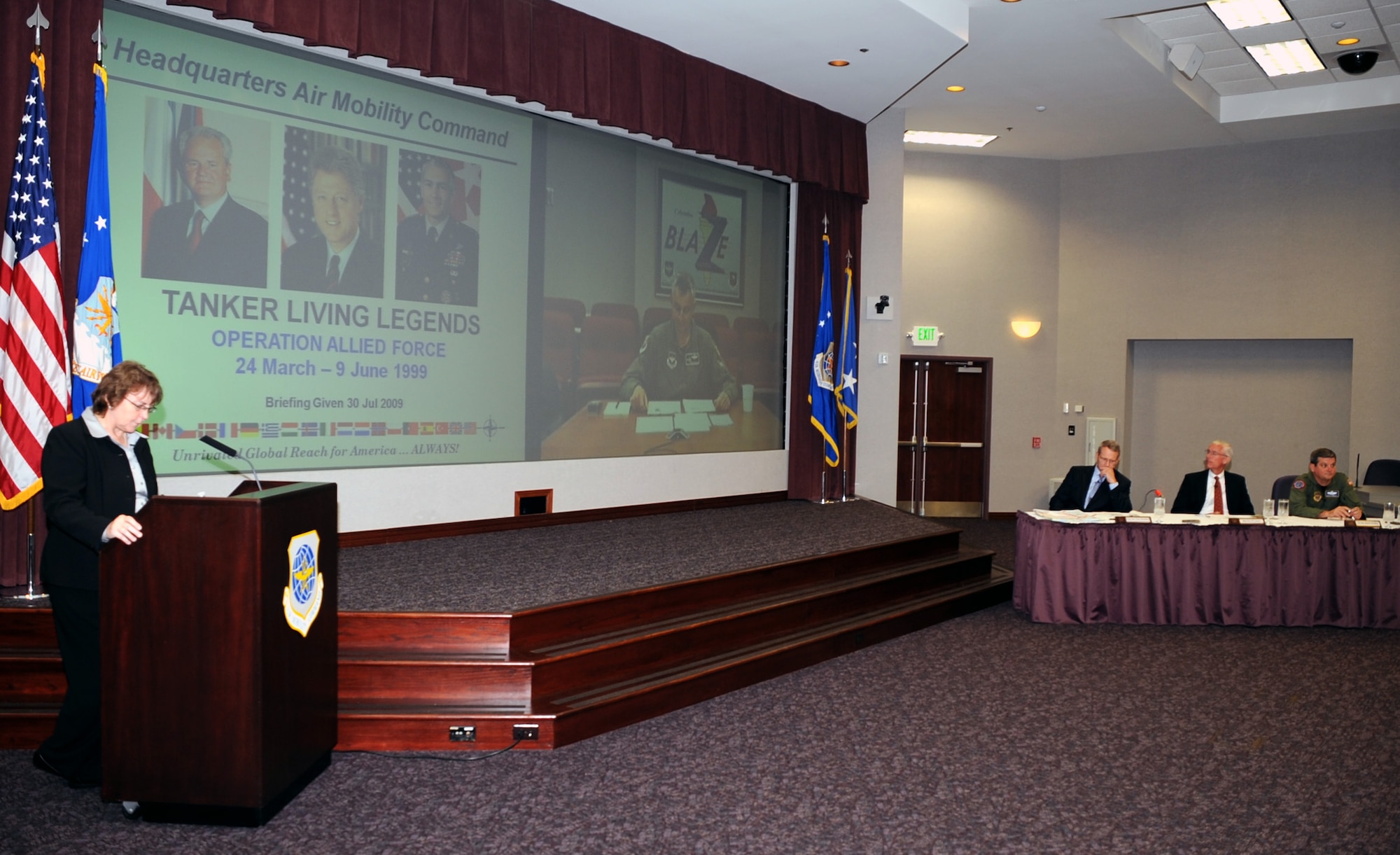 Panel members of the "Tanker Living Legends" speaker series are introduced by retired Col. Gail "Wojo" Wojtowicz, Air Mobility Command director of staff, at the Global Reach Planning Center July 30, 2009, at Scott Air Force Base, Ill.  The "Living Legends" speaker series includes a panel of veterans of past conflicts highlighting their experiences in air refueling during those military operations.  This session included Air Mobility Command Vice Commander Lt. Gen. Rusty Findley; retired Maj. Gen. Timothy "T.C." Jones, former Director of Programs at the Office of the Deputy Chief of Staff for Strategic Plans and Programs at Air Force Headquarters; retired Brig. Gen. Thomas Stickford, former 18th Air Force vice commander; and Col. Roger Watkins, commander of the 14th Flying Training Wing at Columbus Air Force Base, Miss. The panel observed their experiences from Operation Allied Force - the Air War over Kosovo in 1999. (U.S. Air Force Photo/Tech. Sgt. Scott T. Sturkol)