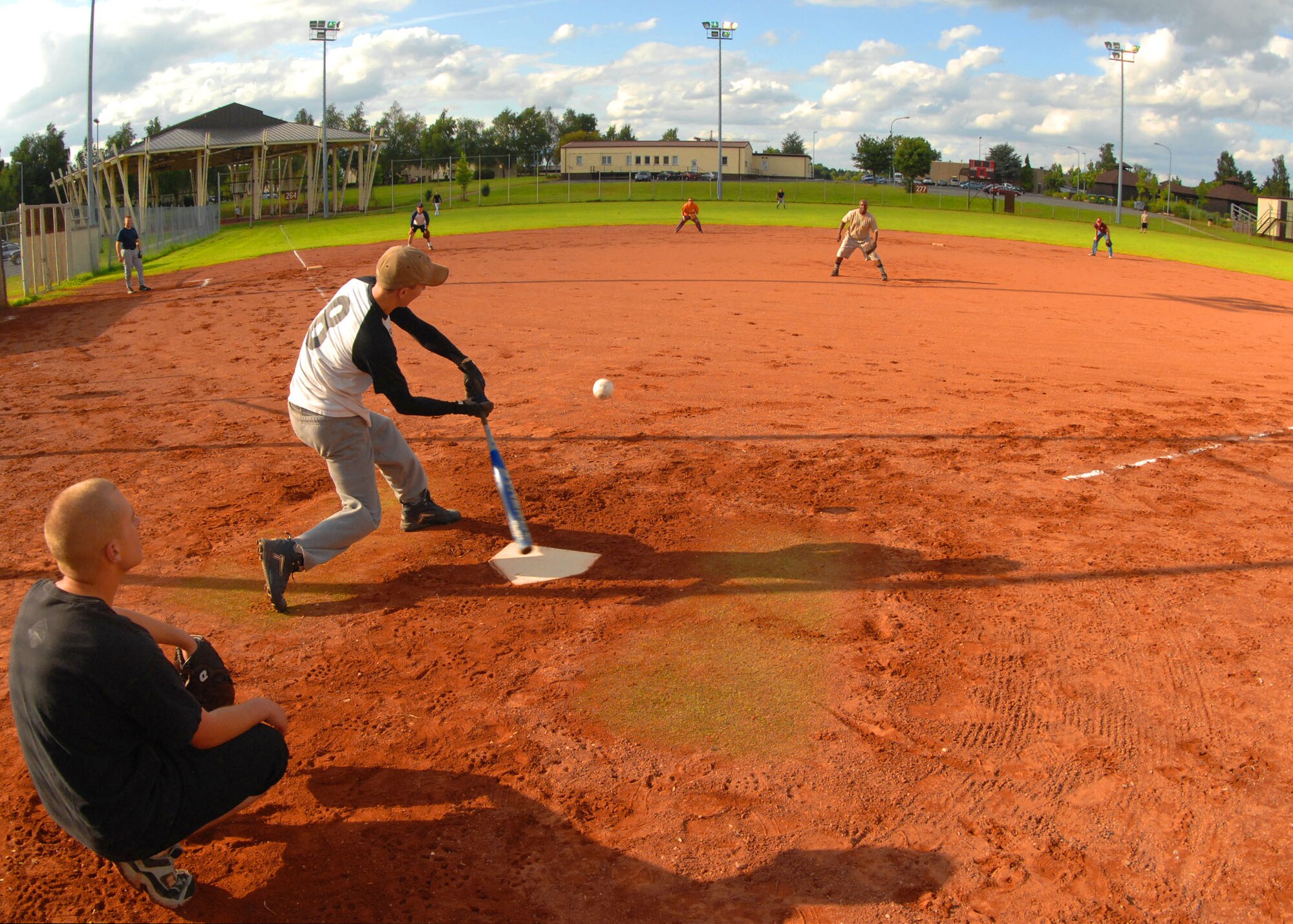 SPANGDAHLEM AIR BASE, Germany -- Caleb Weddle, 52nd Security Forces Squadron, hits the ball into center field during an intramural softball game here July 30. The Security Forces intramural softball team defeated the Aircraft Maintenance Squadron 20-15 in the National League Semifinals to play the 52nd Component Maintenance Squadron-A team for the championship final. CMS-A beat SFS 14-12. (U.S. Air Force photo by Airman 1st Class Nick Wilson)