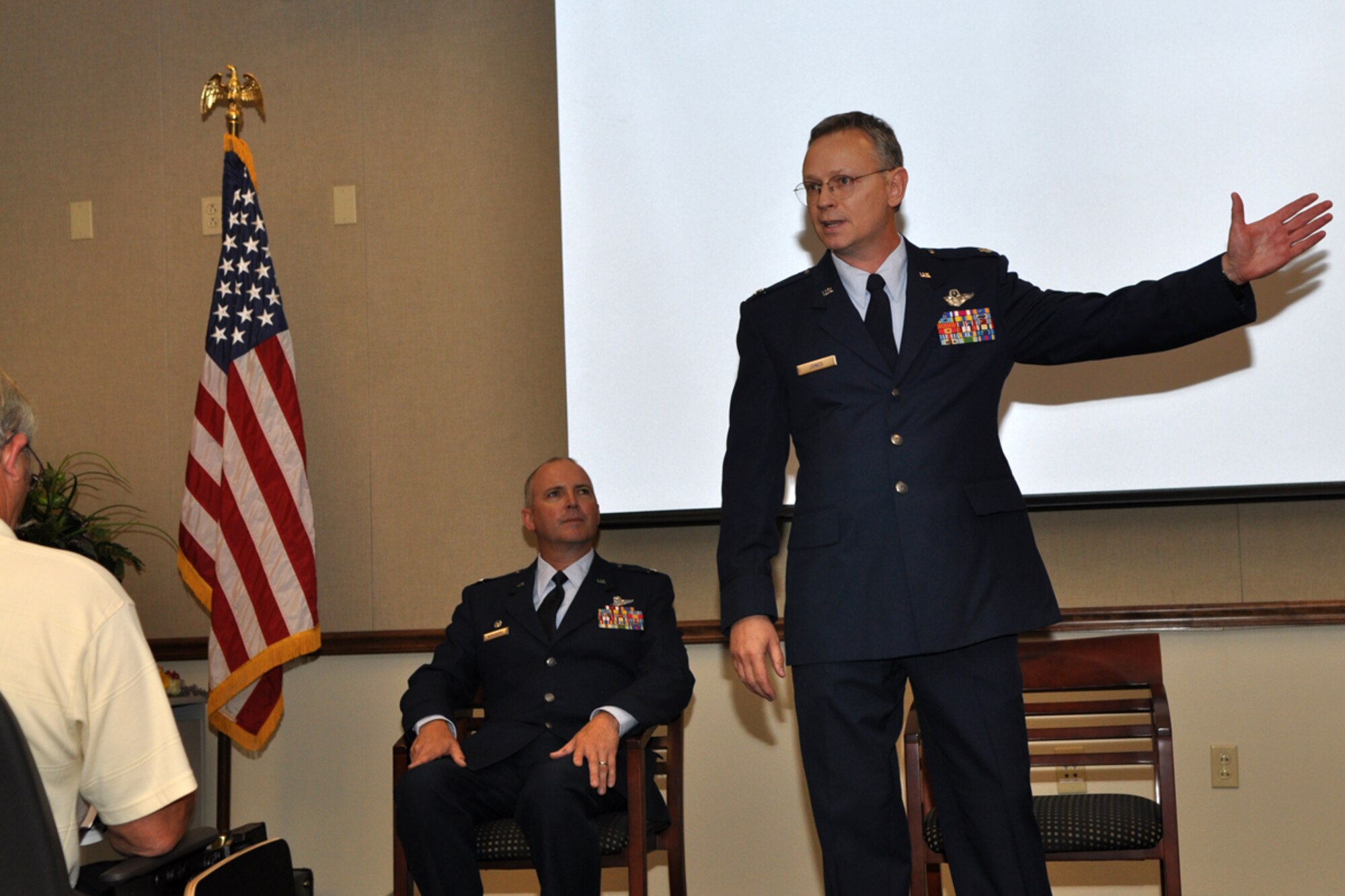 Lt. Col. Joseph Jones, commander, 93rd Bomb Squadron, comments on the squadron’s far reaching history during a change of command ceremony held Sunday, August 2, 2009, at the 93rd Bomb Squadron, at Barksdale Air Force Base, La. Colonel Jones took the reins from Colonel Select Keith Schultz, who is leaving the 93rd BS to take a position with the Pacific Air Forces at Hickam Air Force Base, Hawaii. Colonel Jones, who is also an Internal Medicine Physician, at Tri State Medical Clinic in Shreveport, La., becomes the 9th commander of the 93rd BS at Barksdale. He will be the first who is also a doctor. The 93rd BS recently was given primary responsibility for the Air Force’s B-52 formal training mission after receiving 11 additional B-52s, approximately 320 maintainers and 40 operations personnel from the 2nd Bomb Wing.  This move placed the 93rd in a partnership with the Regular Air Force under the total force initiative. (U.S. Air Force photo/Tech. Sgt. Jeff Walston)