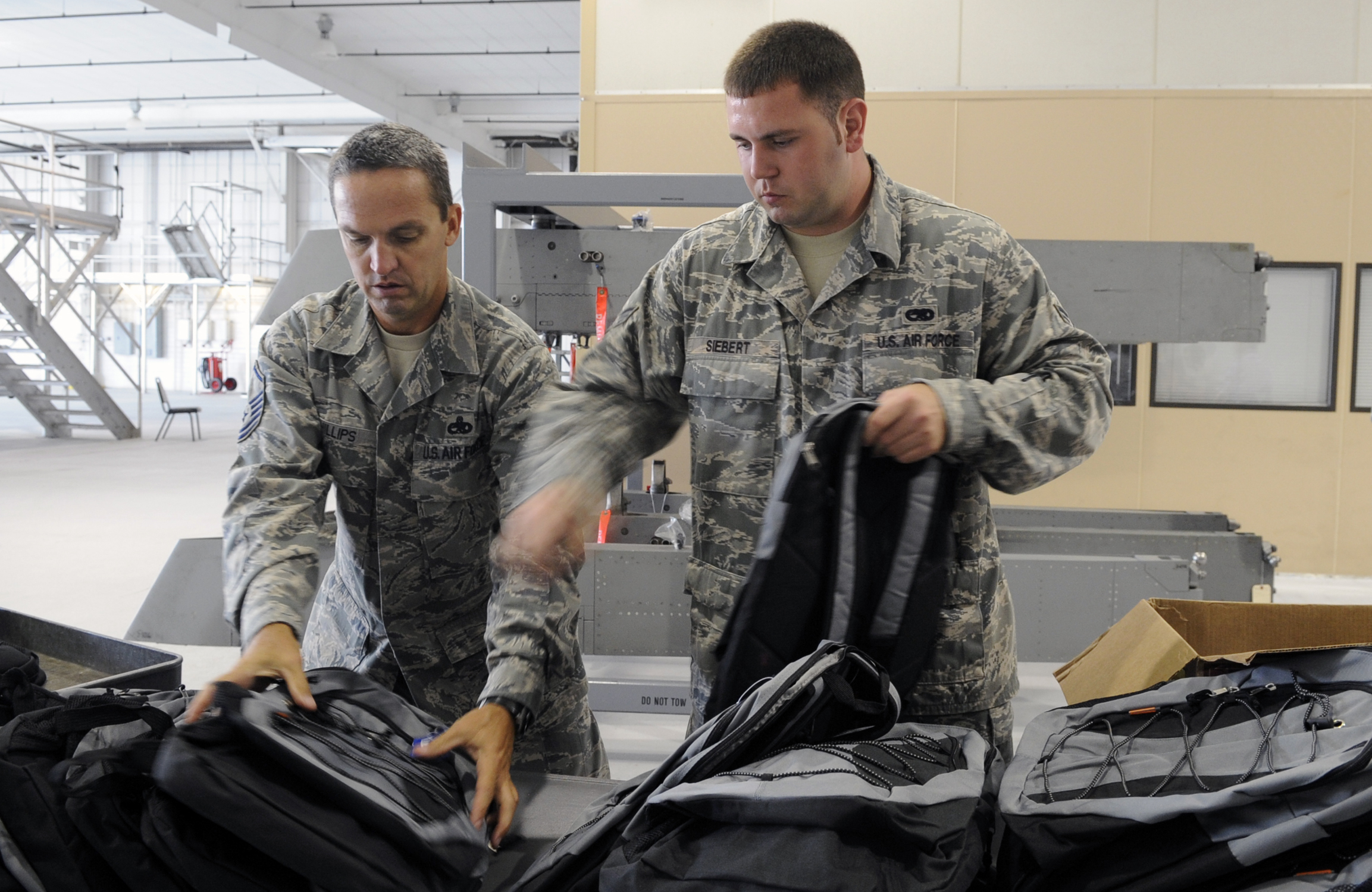 Armed Backpack Brigade rescues financially burdened parents > Joint