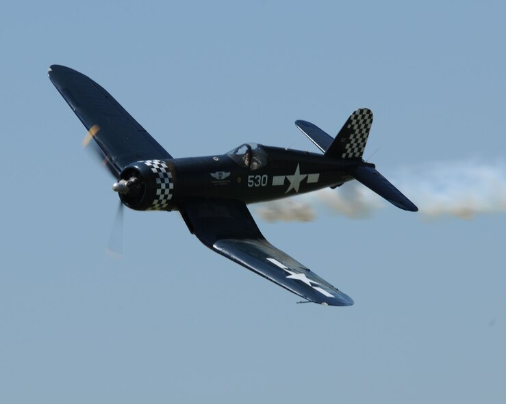 A F4U Corsair, a carrier-capable fighter aircraft that saw service primarily in World War II and the Korean War, puts on an incredible display of the aircraft?s abilities, complete with smoke, at the Sioux Gateway Airport / Col. Bud Day Field,  in Sioux City, Iowa.  The F4U will be on display at the "Air and Ag Show" hosted by the 185th Air Refueling Wing.  Official Air Force Photo by: MSgt. Bill Wiseman (released)