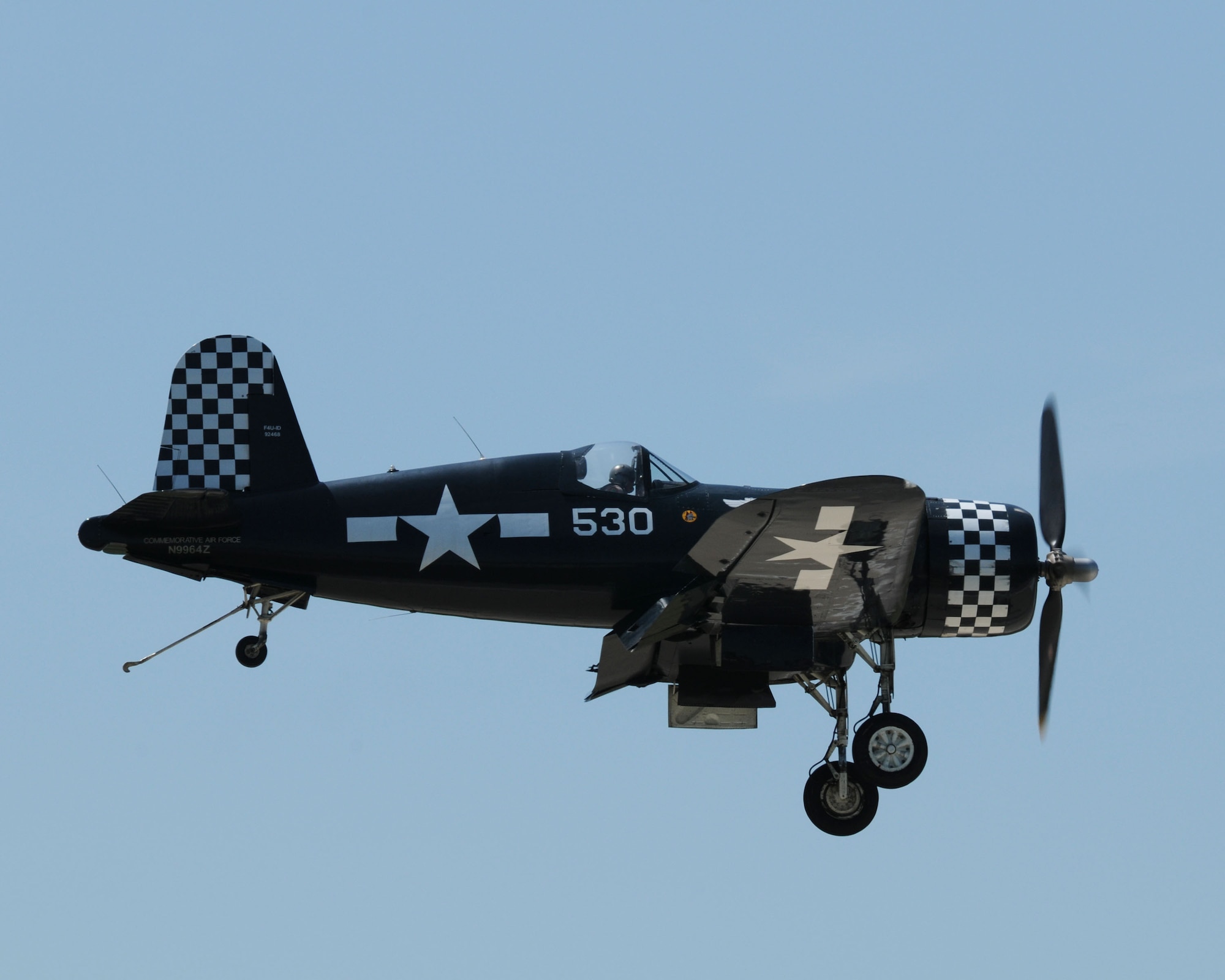 A F4U Corsair, a carrier-capable fighter aircraft that saw service primarily in World War II and the Korean War, prepares to land at the Sioux Gateway Airport / Col. Bud Day Field,  in Sioux City, Iowa.  The F4U will be on display at the "Air and Ag Show" hosted by the 185th Air Refueling Wing.  Official Air Force Photo by: MSgt. Bill Wiseman (released)