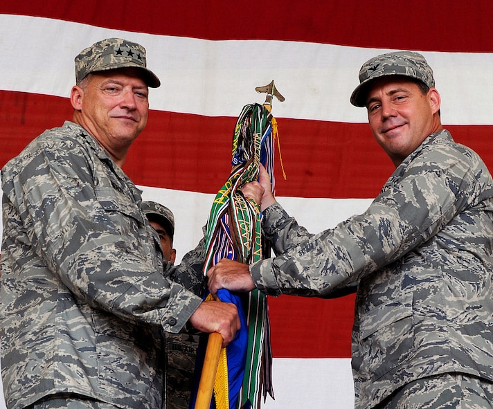 MOODY AIR FORCE BASE, Ga. -- Lt. Gen. Gary North, 9th Air Force and U.S. Air Forces Central commander, Shaw Air Force Base, S.C, presides as Col. John Horner assumes position as the new 93rd Air Ground Operations Wing commander during a change of command ceremony here July 31. (U.S. Air Force photo by Airman 1st Class Joshua Green)