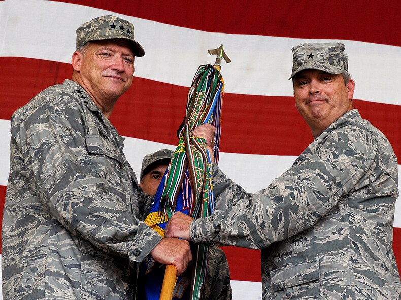 MOODY AIR FORCE BASE, Ga. -- Lt. Gen. Gary North, 9th Air Force and U.S. Air Forces Central commander, Shaw Air Force Base, S.C, presides as Brig. Gen. Michael Longoria, outgoing 93rd Air Ground Operations Wing commander, relinquishes command during a ceremony here July 31. General Longoria is scheduled to retire from the Air Force after 30 years of service. (U.S. Air Force photo by Airman 1st Class Joshua Green)