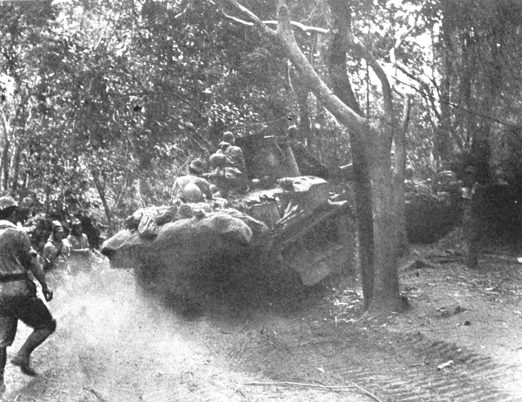 Japanese tank moving forward on Bataan. Without anti-tank weapons, the PACR was helpless to stop an armored attack. (U.S. Air Force photo)