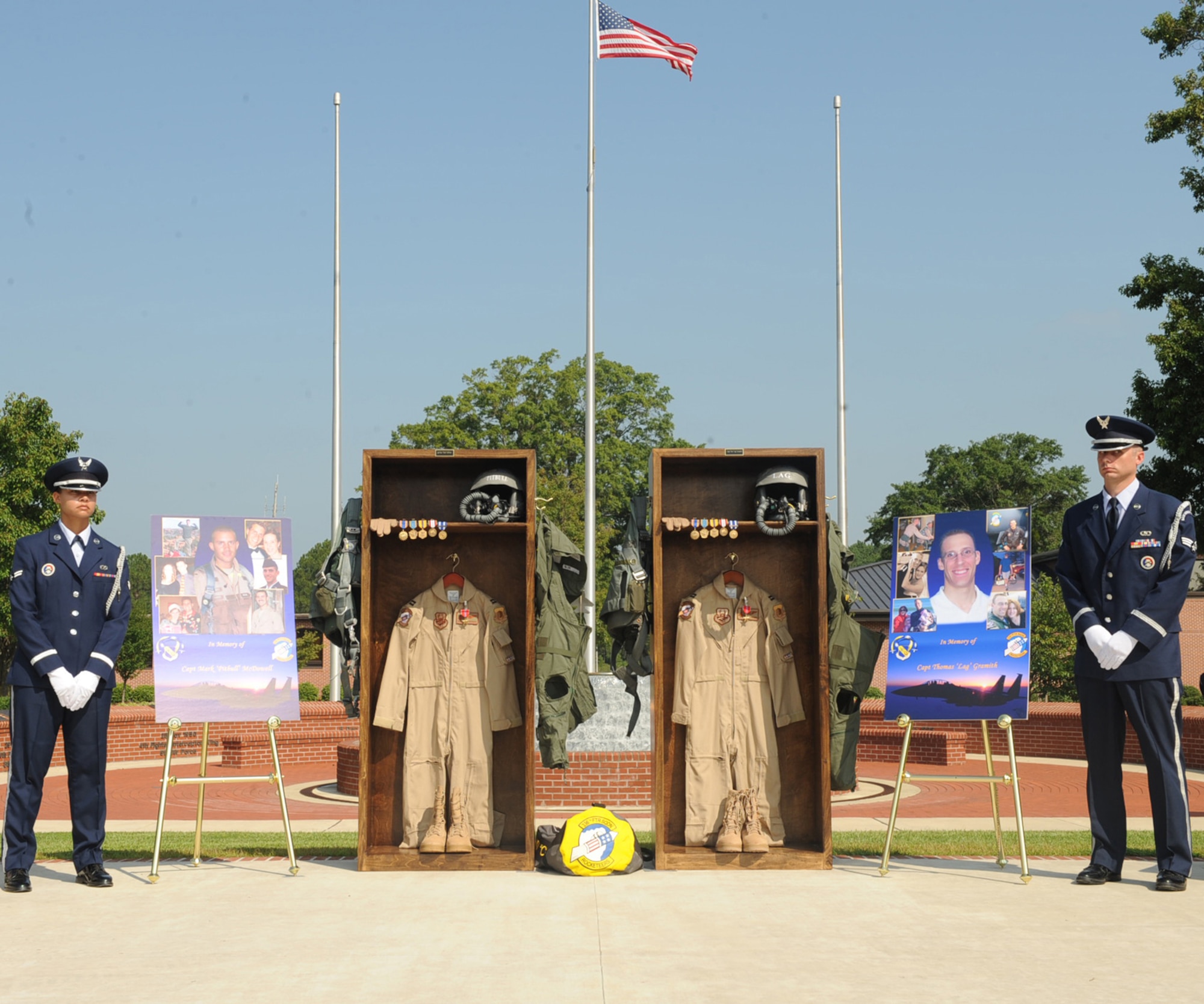 Members of the 4th Fighter Wing Honor Guard stand guard at the lockers of fallen 336th aircrew, Captains Mark McDowell and Thomas Gramith.(U.S. Air Force photo by Senior Airman Ciara Wymbs)