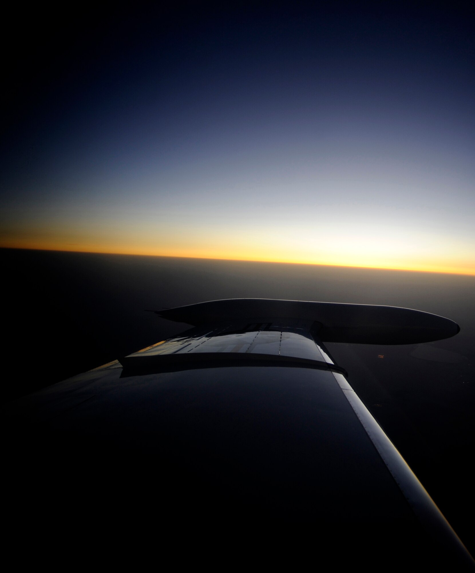 The wing of a U.S. Air Force C-21 from the 379th Expeditionary Operations Group, reflects the sunset during combat operations over Southwest Asia July 26, 2009. (U.S. Air Force photo by Staff Sgt. Shawn Weismiller/released)
