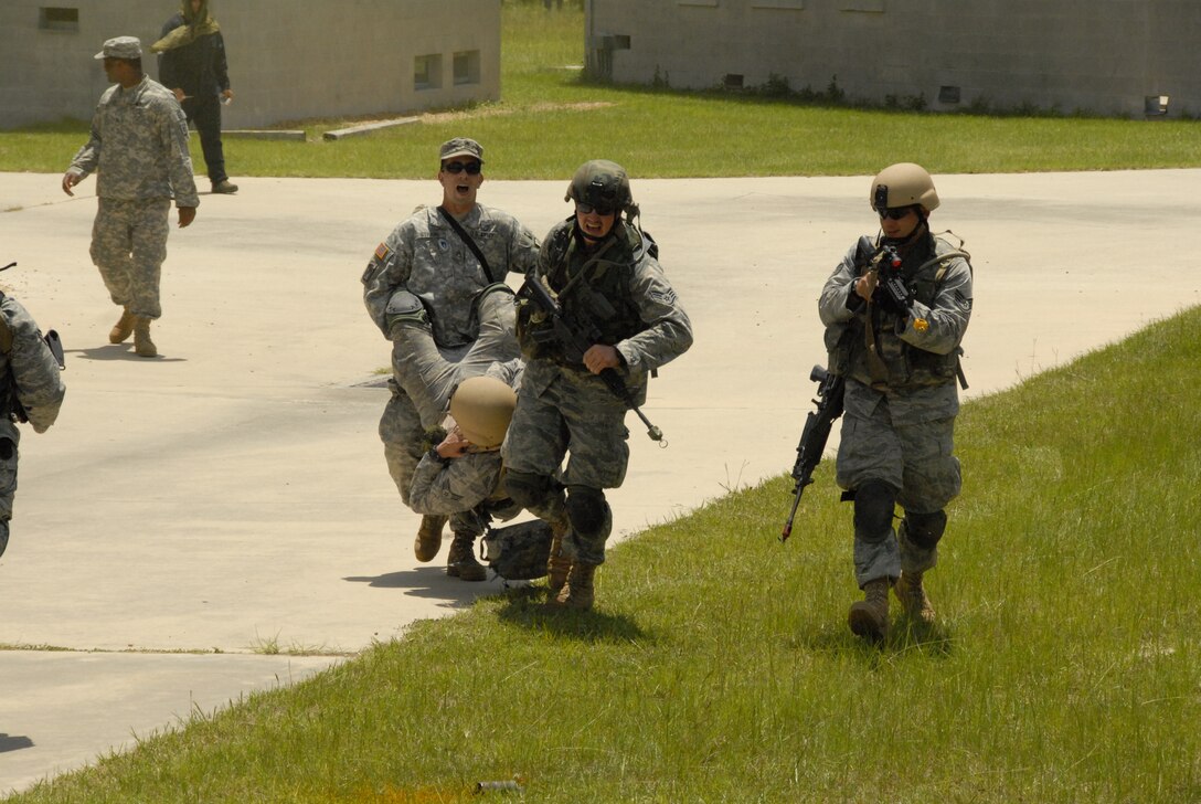Combat weather Airmen train in combat lifesaving skills at Camp Blanding Joint Training Center, Fla. The combat lifesaving training is part of exercise Cyclogenesis, a training exercise designed to prepare combat weather Airmen for deployment with the Army. (Air National Guard photo by TSgt. Jeffrey Trumble)