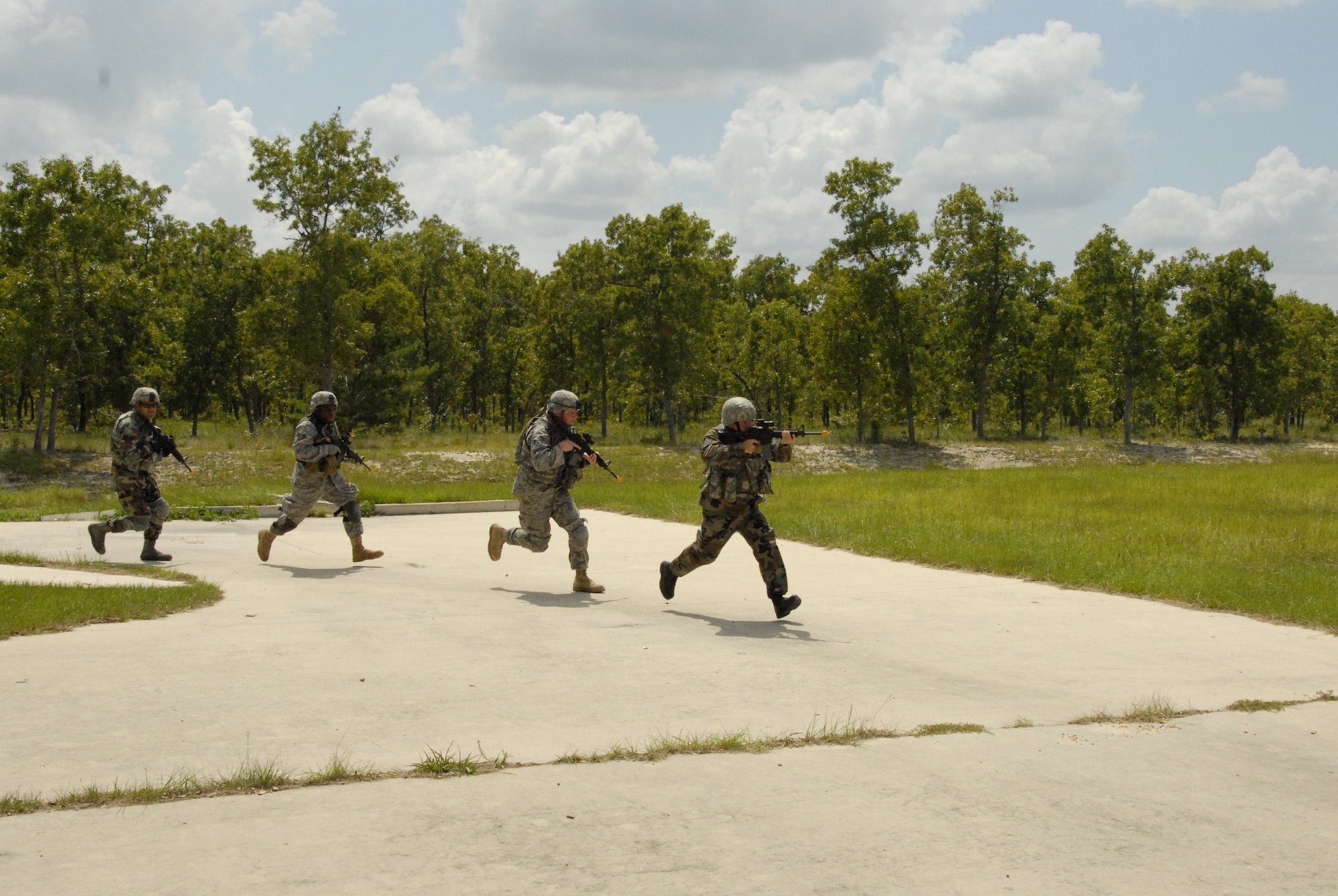 Combat weather Airmen train in combat patrolling at Camp Blanding Joint Training Center, Fla. The combat patrol training is part of exercise Cyclogenesis, a training exercise designed to prepare combat weather Airmen for deployment with the Army. (Air National Guard photo by TSgt. Jeffrey Trumble)