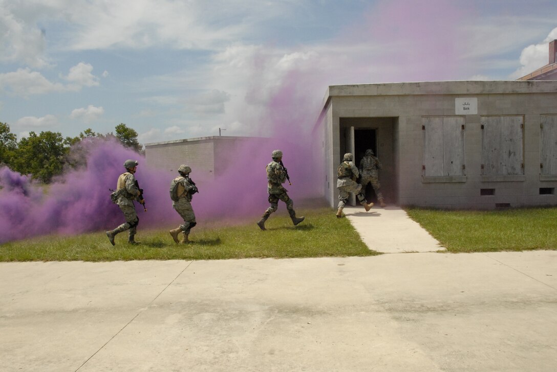 Combat weather Airmen train in combat patrolling at Camp Blanding Joint Training Center, Fla. The combat patrol training is part of exercise Cyclogenesis, a training exercise designed to prepare combat weather Airmen for deployment with the Army. (Air National Guard photo by TSgt. Jeffrey Trumble)