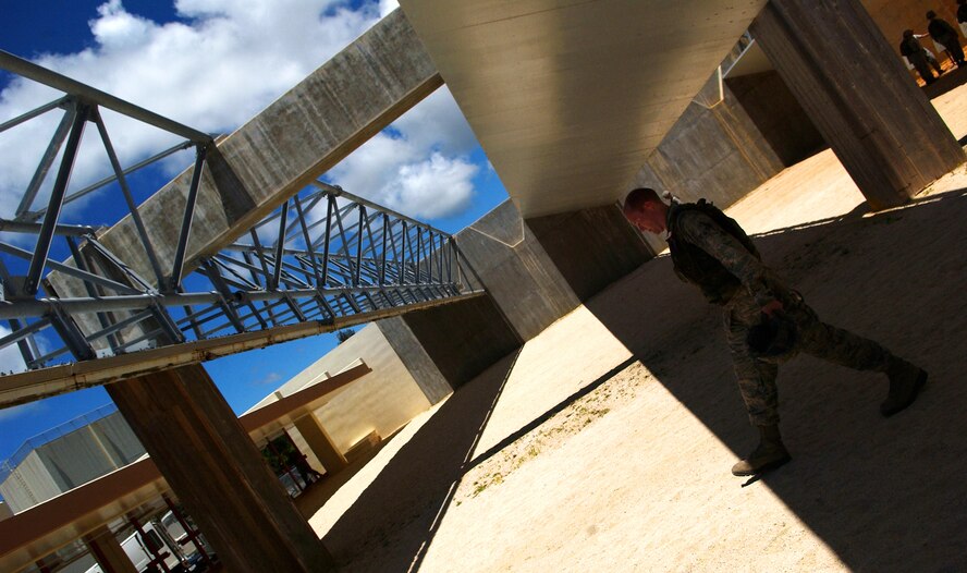 The 18th Security Forces train augmentees at the Combat Arms Training and Maintenance to reinforce manning shortfalls July 29 at Kadena Air Base, Japan. The Airmen go through a set 3-day course consisting of weapons firing, classroom instruction of SF responsibilities, and hands-on training made up of searching, handcuffing, and challenging individuals and vehicles. 
(U.S. Air Force photo/Tech. Sgt. Rey Ramon)          