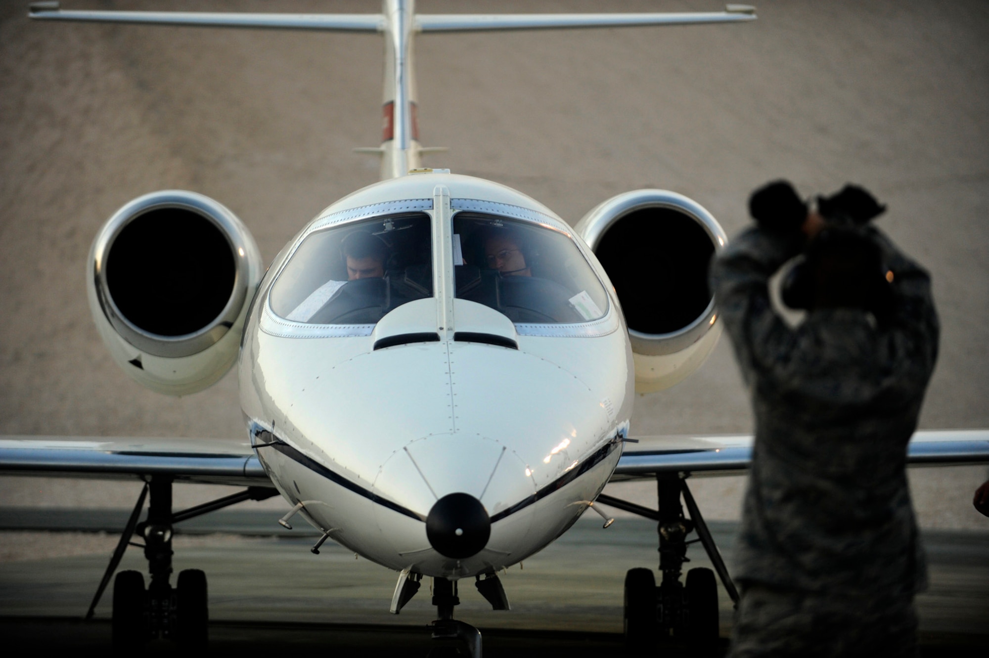 A C-21, assigned to the 379th Expeditionary Operations Group, readies for a mission in Southwest Asia. The C-21 is a twin turbofan engine aircraft used for cargo and passenger airlift. (US Air Force Photo/Staff Sgt. Michael Keller)