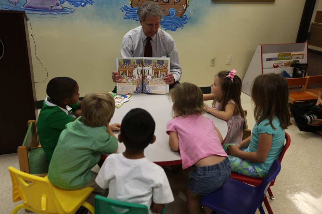 U.S. Rep. Walter B. Jones (R-N.C.) visited Naval Hospital Camp Lejeune’s Pediatric Clinic to read a few books to a small group of children as part of the Reach Out and Read program, Aug. 4. The Reach Out and Read program is a national, non-profit organization, which began in 1989. The program targets children ages 6 months to 5 years old. The pediatric primary care provider gives a new age and development-appropriate children’s book to the child at their pediatric checkups for them to keep and take home with them. Then the care provider encourages parents to read aloud to their young children at home.