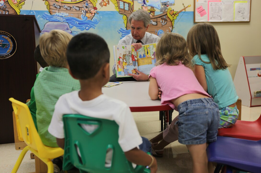 U.S. Rep. Walter B. Jones (R-N.C.) visited Naval Hospital Camp Lejeune’s Pediatric Clinic to read a few books to a small group of children as part of the Reach Out and Read program, Aug. 4. The Reach Out and Read program is a national, non-profit organization, which began in 1989. The program targets children ages 6 months to 5 years old. The pediatric primary care provider gives a new age and development-appropriate children’s book to the child at their pediatric checkups for them to keep and take home with them. Then the care provider encourages parents to read aloud to their young children at home.