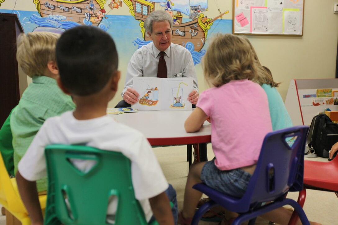 U.S. Rep. Walter B. Jones (R-N.C.) visited Naval Hospital Camp Lejeune’s Pediatric Clinic to read a few books to a small group of children as part of the Reach Out and Read program, Aug. 4. The Reach Out and Read program is a national, non-profit organization, which began in 1989. The program targets children ages 6 months to 5 years old. The pediatric primary care provider gives a new age and development-appropriate children’s book to the child at their pediatric checkups for them to keep and take home with them. Then the care provider encourages parents to read aloud to their young children at home.