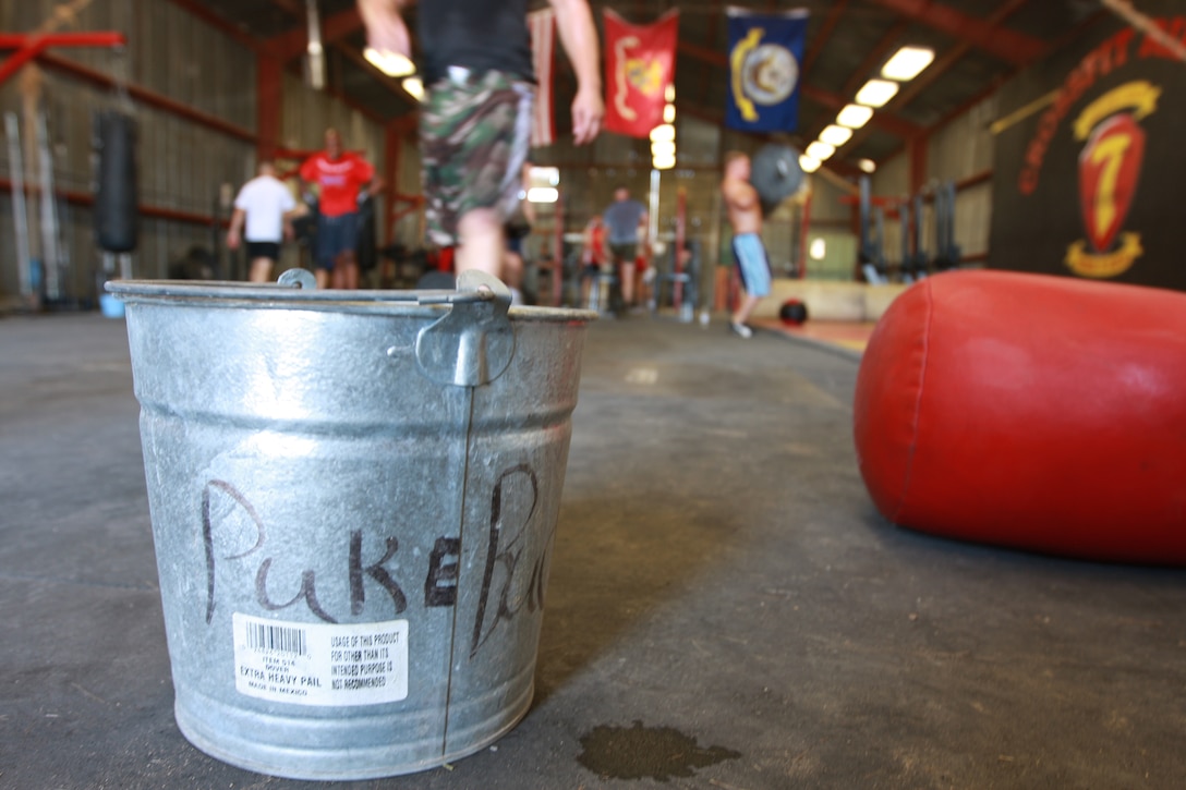 Crossfit is an intense workout. The staff of the gym leaves out many ‘puke buckets’ like this because the workout is so rigorous. Many Marines use it as an alternative form of physical training to stay in peak physical condition.