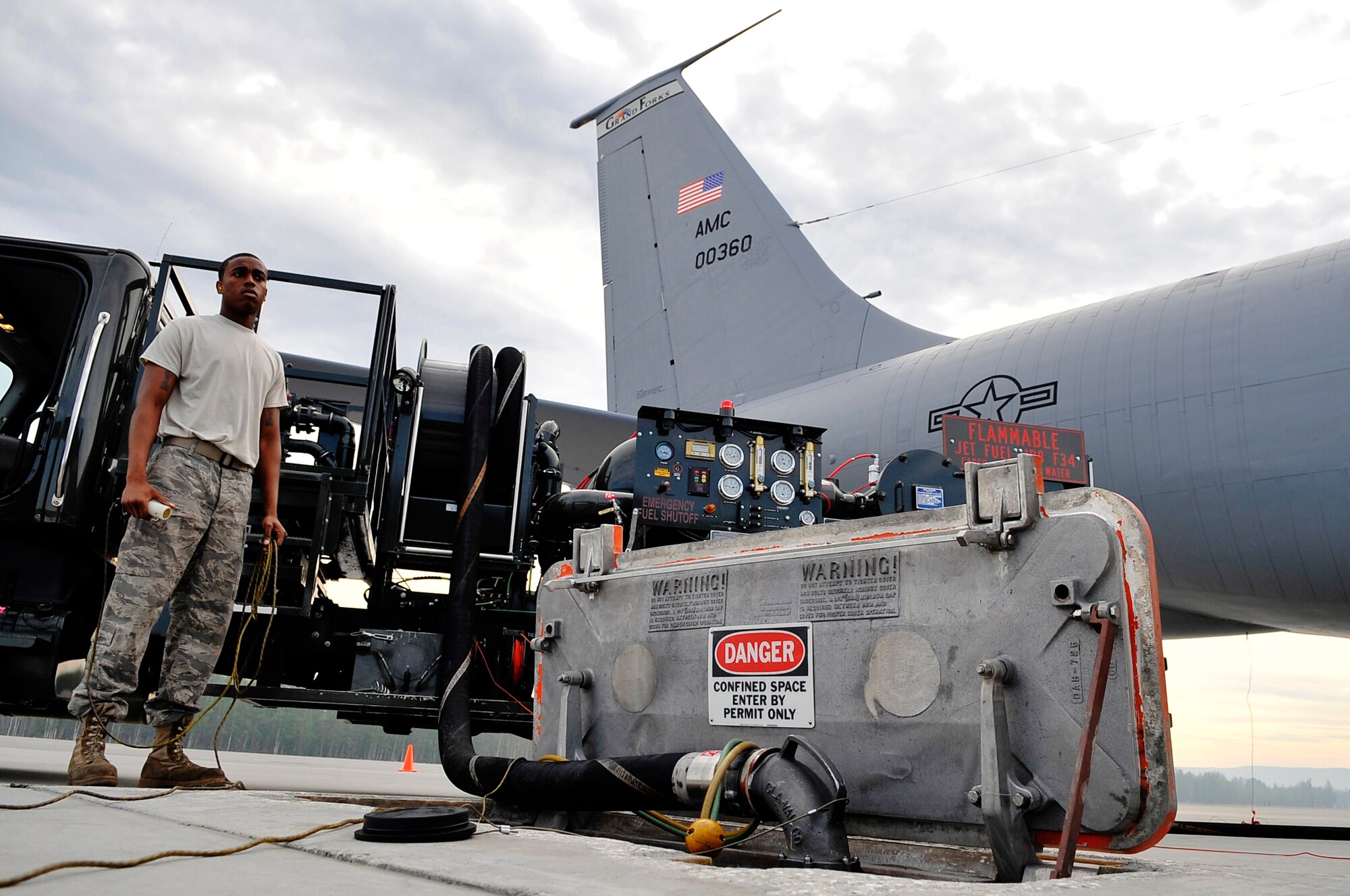 Airman 1st Class Timothy Proby refuels a KC-135 during Red Flag-Alaska 09-3 July 31, 2009, Eielson AFB. Fuel is pulled from a hydrant beneath the runway, and then pumped through the fuel truck and in to the KC-135. Airman Proby is assigned to the 51st Logistics Readiness Squadron, fuels management flight, Osan Air Base, Republic of Korea. (U.S. Air Force photo/Staff Sgt. Christopher Boitz)