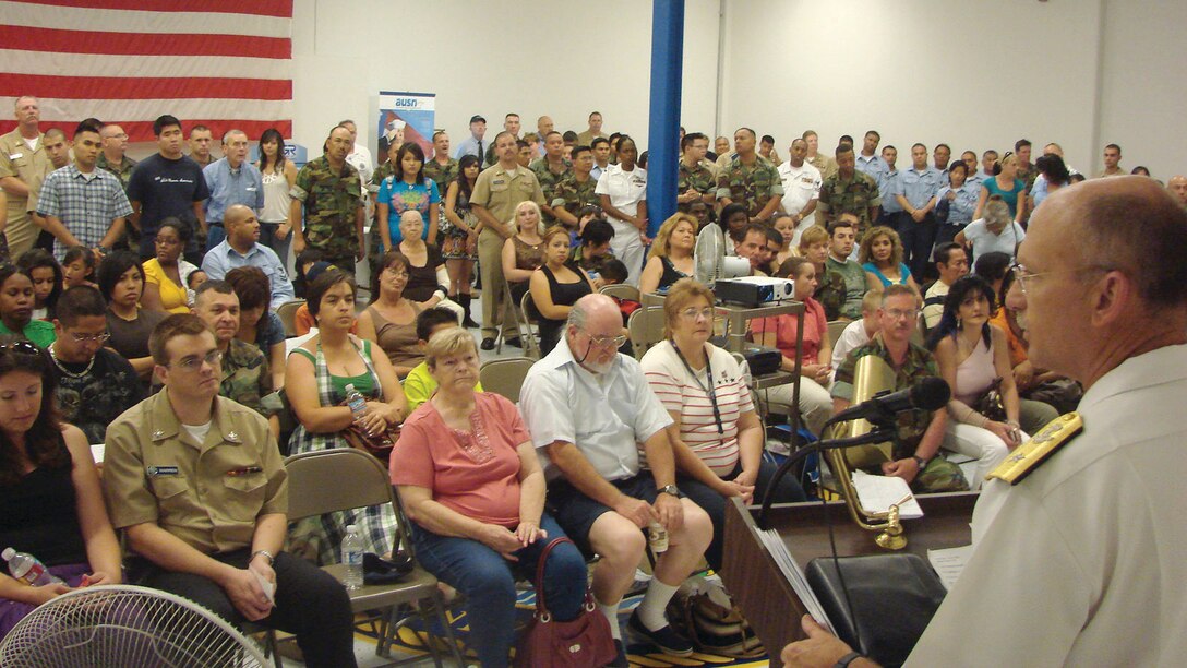 Rear Adm. (sel) Mike Shatynski addresses 430 Navy Operational Support Center Moreno Valley reservists and their families during Family Readiness Day on July 19. Rear Adm. (sel) Shatynski is the Vice Commander of Naval Surface Forces. (U.S. Navy photo by Fire Controlman 1st Class Carlos Cruz)