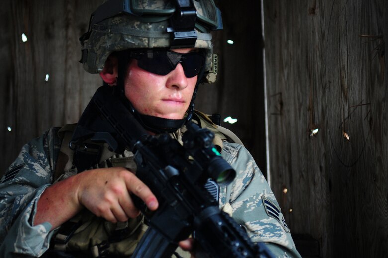 U.S. Air Force Senior Airman Richard Garrett, a Tactical Air Control Party ROMAD from the 1st Air Support Operations Squadron, secures his position during Allied Strike, Grafenwoehr, Germany, Aug. 3, 2009. Allied Strike a multi-service, multi-national exercise presents realistic scenarios for participants to hone skills before deploying. (U.S. Air Force photo by Staff Sgt. Jocelyn Rich)