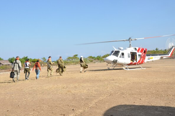 BIKELI, ATAURO – U.S. Air Force medical personnel and 2nd Regiment, Royal Australian Regiment depart after providing basic medical care to 283 residents of the fishing village Bikeli, Atauro, in support of  Pacific Angel on July 21, 2009. Pacific Angel is a 13th Air Force led humanitarian assistance operation aimed at improving military civic cooperation between the United States and Timor Leste.  (U.S.  Air Force photo/Tech Sgt. Cohen A. Young)