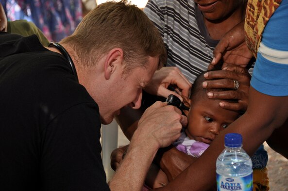 BIKELI, ATAURO – U.S. Air Force medical personnel and 2nd Regiment, Royal Australian Regiment Soldiers, provide basic medical care by checking vital signs, checking for Malaria, conducting health assessments and distribute antibiotics and Tylenol when visiting the fishing village Bikeli, Atauro, in support of  Pacific Angel on July 21, 2009. Pacific Angel is a 13th Air Force led humanitarian assistance operation aimed at improving military civic cooperation between the United States and Timor Leste.  (U.S.  Air Force photo/Tech Sgt. Cohen A. Young)