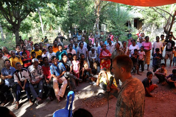 BIKELI, ATAURO – U.S. Air Force Lt. Col. Phillip Goff, chief of bioenvironmental engineering at Hurlburt Field, Fla.,  briefs the villagers of Bikei, Atauro, about the services that the combined medical team of Airmen, Soldiers from the Royal Australian Regiment, and the government of Timor Leste, were providing while visiting the tiny fishing village on July 21, 2009 in support of Pacific Angel 09. The team checked vital signs, checked for Malaria, conducted health assessments and distributed antibiotics and Tylenol to the island residents. Pacific Angel is a 13th Air Force led humanitarian assistance operation aimed at improving military civic cooperation between the United States and Timor Leste.  (U.S.  Air Force photo/Tech Sgt. Cohen A. Young)
