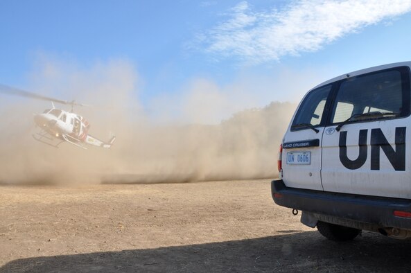 BIKELI, ATAURO – U.S. Air Force medical personnel and 2nd Regiment, Royal Australian Regiment Soldiers depart after providing basic medical care by checking vital signs, checking for Malaria, conducting health assessments and distributing antibiotics and Tylenol to the residents of the fishing village Bikeli, Atauro, in support of  Pacific Angel 09 on July 21, 2009. Pacific Angel is a 13th Air Force led humanitarian assistance operation aimed at improving military civic cooperation between the United States and Timor Leste.  (U.S.  Air Force photo/Tech Sgt. Cohen A. Young)