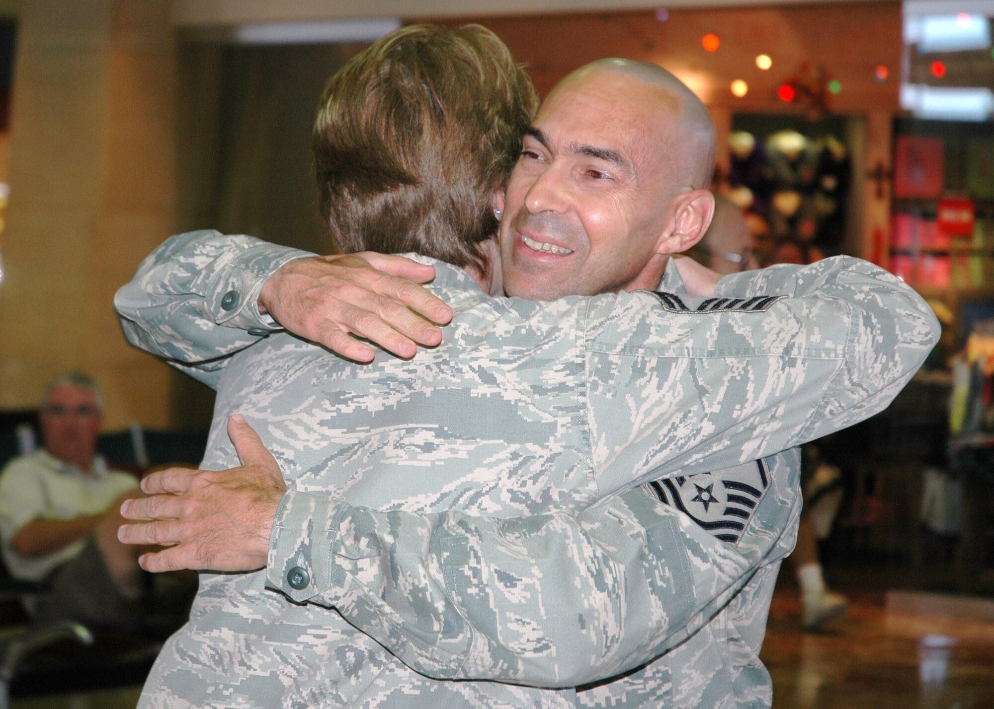 Master Sgt. David Meszaros, 944th Medical Squadron opthamalogy technician, is welcomed home July 30 after spending 317 days deployed to Joint Base Balad, Iraq. (U.S. Air Force photo/Tech. Sgt. Susan Stout)