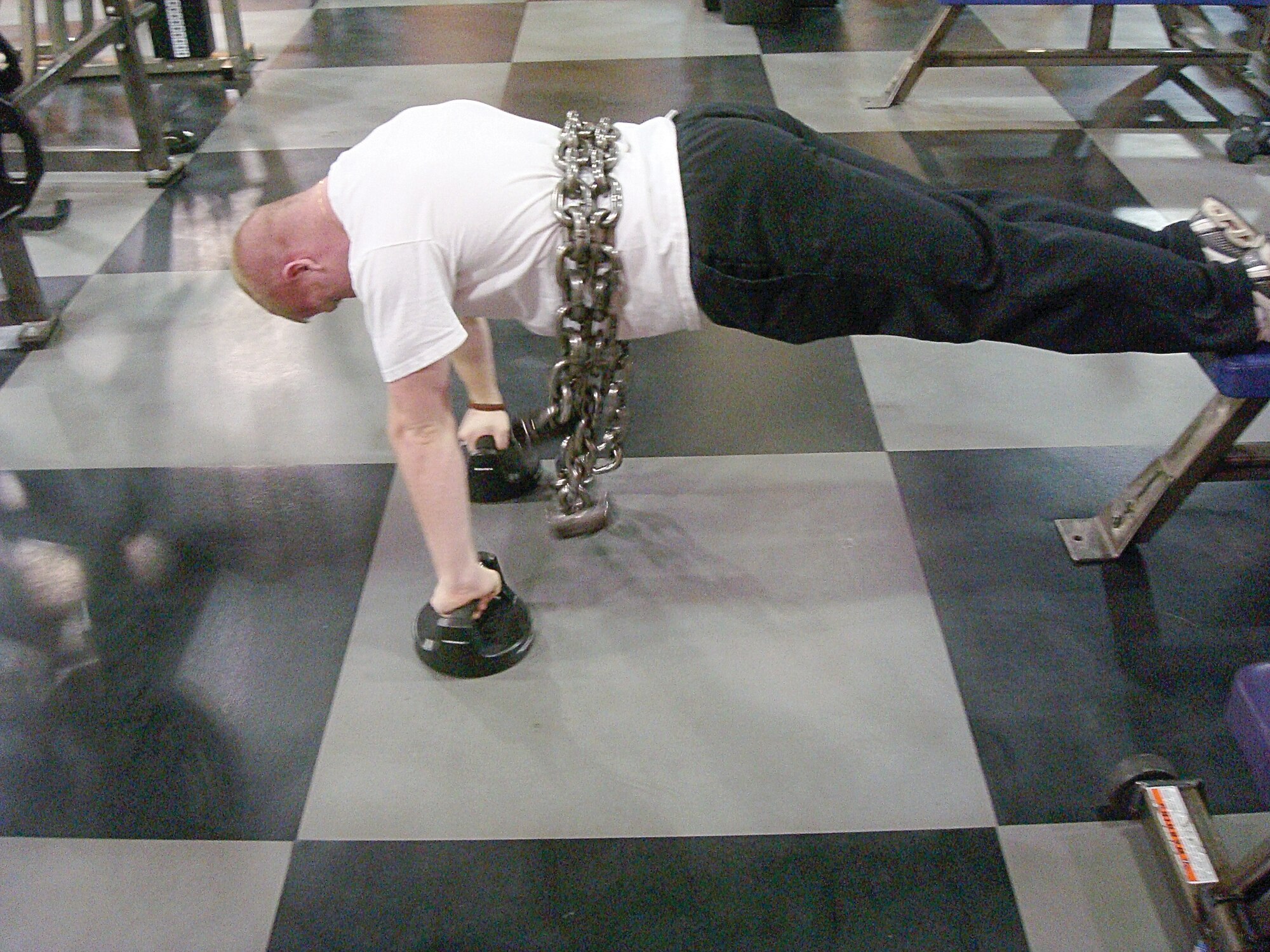 Sgt. Michael Bradley, 34th Fighter Squadron Life Support technician, completes strength training moves at a gym in Salt Lake City earlier this year in preparation for the Vancouver 2010 Winter Olympic Games trials in conjunction with the Air Force World Class Athlete Program.