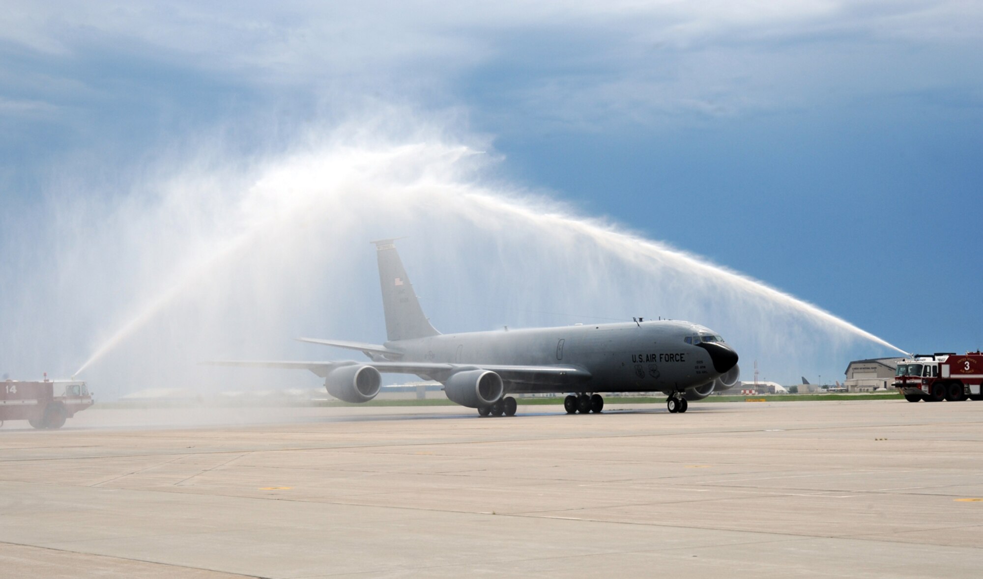 Team McConnell's RODEO team receives a wet-welcome home at McConnell Air Force Base, Kan., on July 25. Reserve Airmen from the 931st Air Refueling Group and active-duty Airmen represented McConnell as a blended team at the week-long, biennial competition for the first time. (U.S. Air Force photo/Tech. Sgt. Chyrece Campbell)
