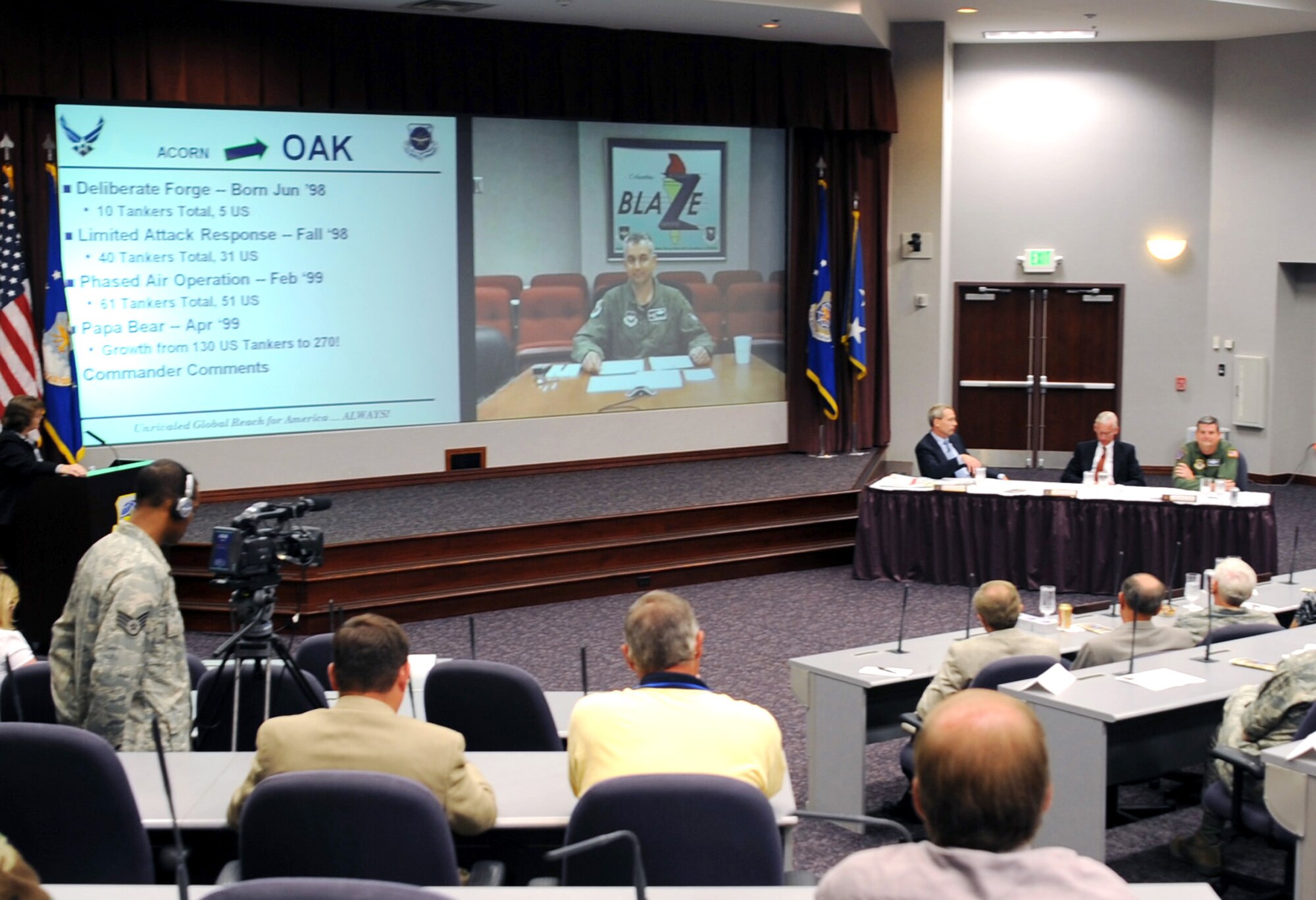 A four-person panel participating in the "Tanker Living Legends" speaker series hold their discussion at the Global Reach Planning Center July 30 at Scott Air Force Base, Ill. The "Living Legends" speaker series includes a panel of veterans of past conflicts highlighting their experiences in air refueling during Operation Allied Force. This session included Lt. Gen. Vern M. "Rusty" Findley II, the Air Mobility Command vice commander; retired Maj. Gen. Timothy C. Jones, the former director of programs at the Office of the Deputy Chief of Staff for Strategic Plans and Programs at Air Force Headquarters; retired Brig. Gen. Thomas E. Stickford, the former 18th Air Force vice commander; and Col. Roger Watkins, commander of the 14th Flying Training Wing at Columbus Air Force Base, Miss. (U.S. Air Force photo/Tech. Sgt. Scott T. Sturkol) 