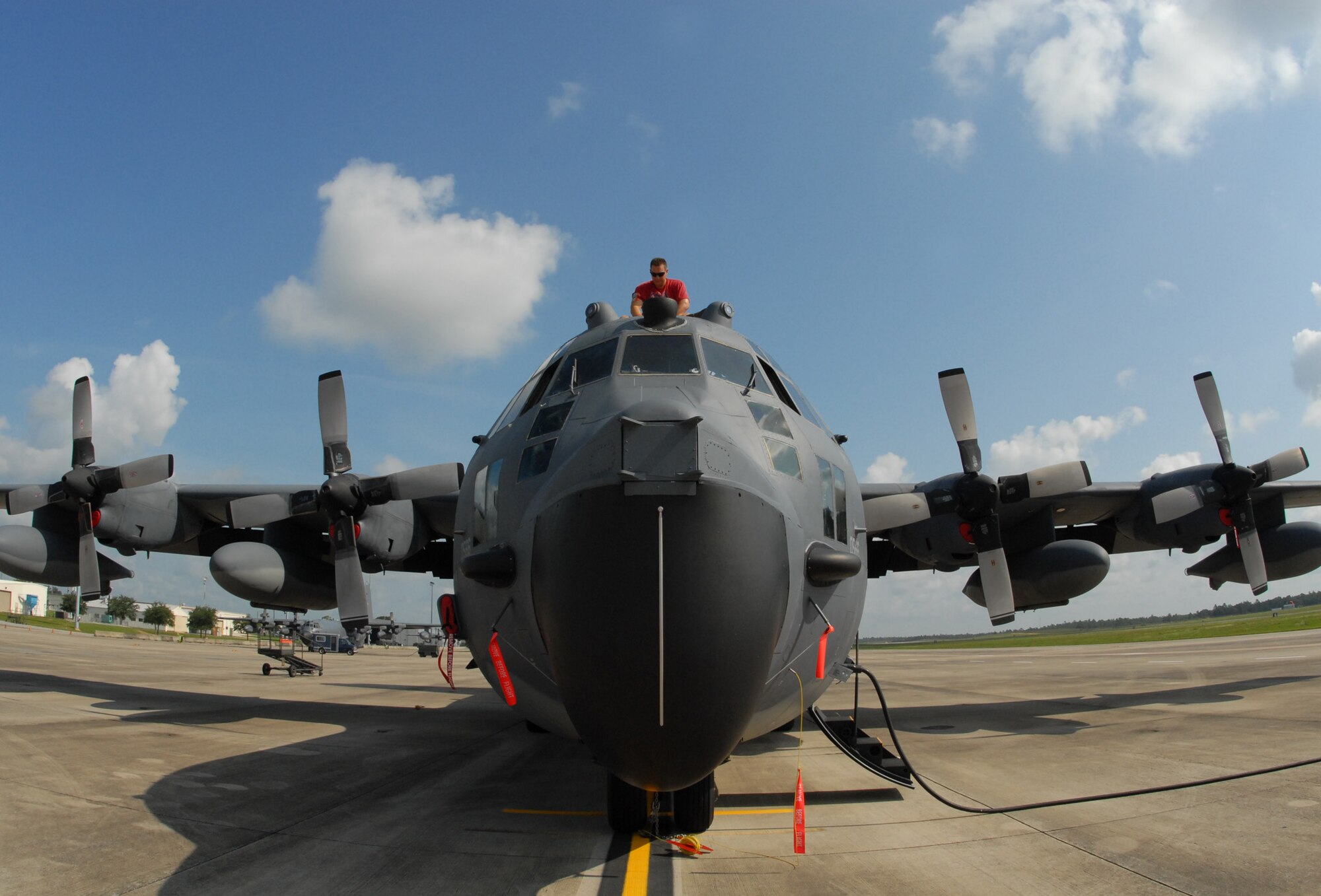 Tech. Sgt. Robert Pinard, 919th Special Operations Wing, replaces the inflight refueling box on top of a MC-130E Aug. 3 at Duke Field.  Duke Field, an Eglin Air Force Base Reserve tenant base, is home to the only special operations wing in Air Force Reserve Command. The unit employs nearly 1,200 reservists.  The MC-130 provides infiltration, exfiltration and resupply of special operations forces and equipment in hostile or denied territory.  Secondary missions include psychological operations and helicopter air refueling.  (U.S. Air Force photo/Staff Sgt. Samuel King Jr.)