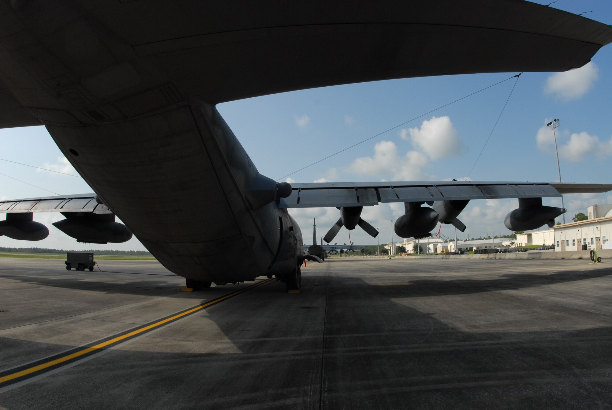 A line of Special Operations Wing MC-130Es await a mission Aug. 3 morning at Duke Field.  Duke Field, an Eglin Air Force Base Reserve tenant base, is home to the only special operations wing in Air Force Reserve Command. The unit employs nearly 1,200 reservists.  The MC-130 provides infiltration, exfiltration and resupply of special operations forces and equipment in hostile or denied territory.  Secondary missions include psychological operations and helicopter air refueling.  (U.S. Air Force photo/Staff Sgt. Samuel King Jr.)