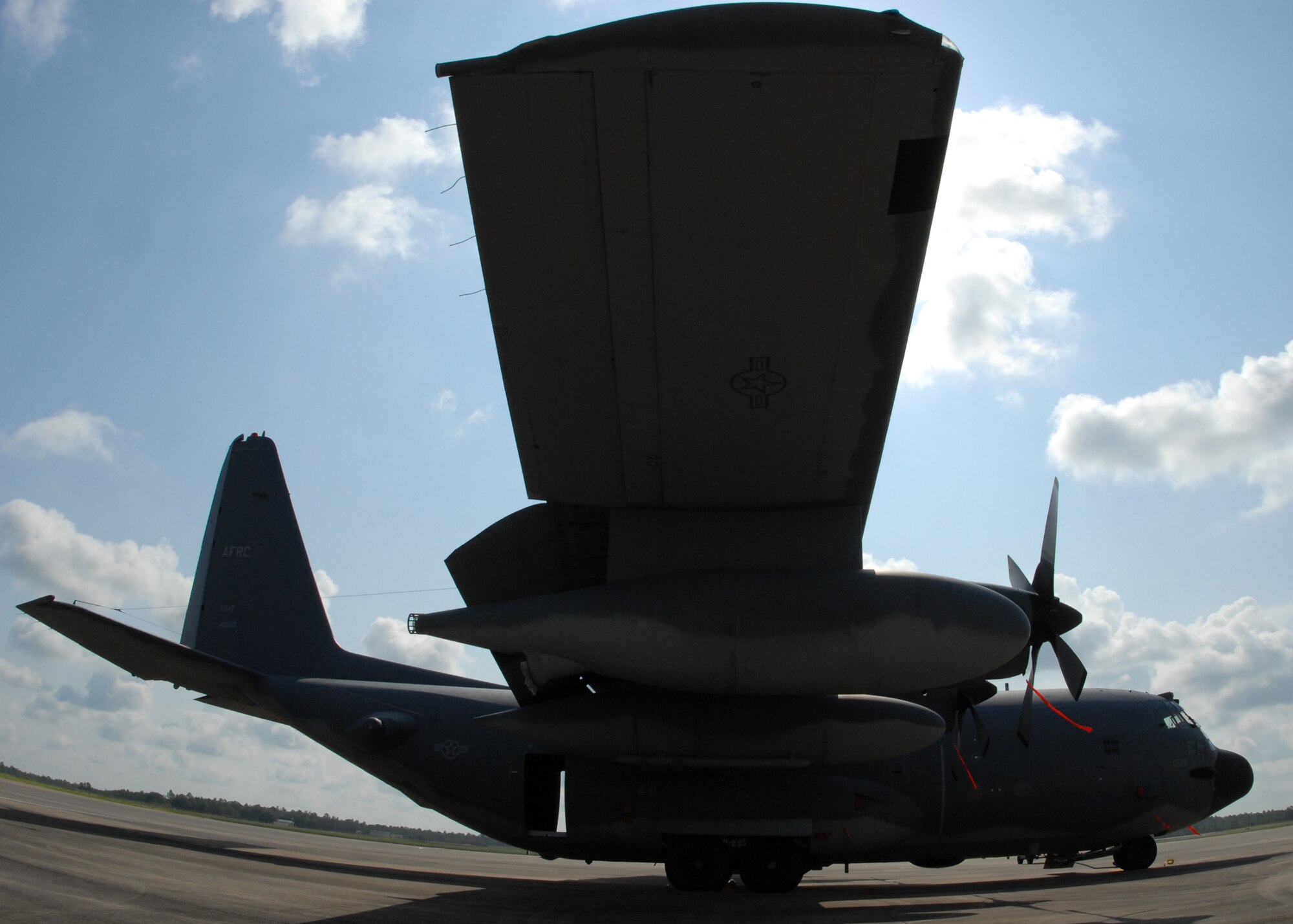 A 919th Special Operations Wing MC-130E Combat Talon I awaits a mission Aug. 3 morning at Duke Field.  Duke Field, an Eglin Air Force Base Reserve tenant base, is home to the only special operations wing in Air Force Reserve Command. The unit employs nearly 1,200 reservists.  The MC-130 provides infiltration, exfiltration and resupply of special operations forces and equipment in hostile or denied territory.  Secondary missions include psychological operations and helicopter air refueling.  (U.S. Air Force photo/Staff Sgt. Samuel King Jr.)